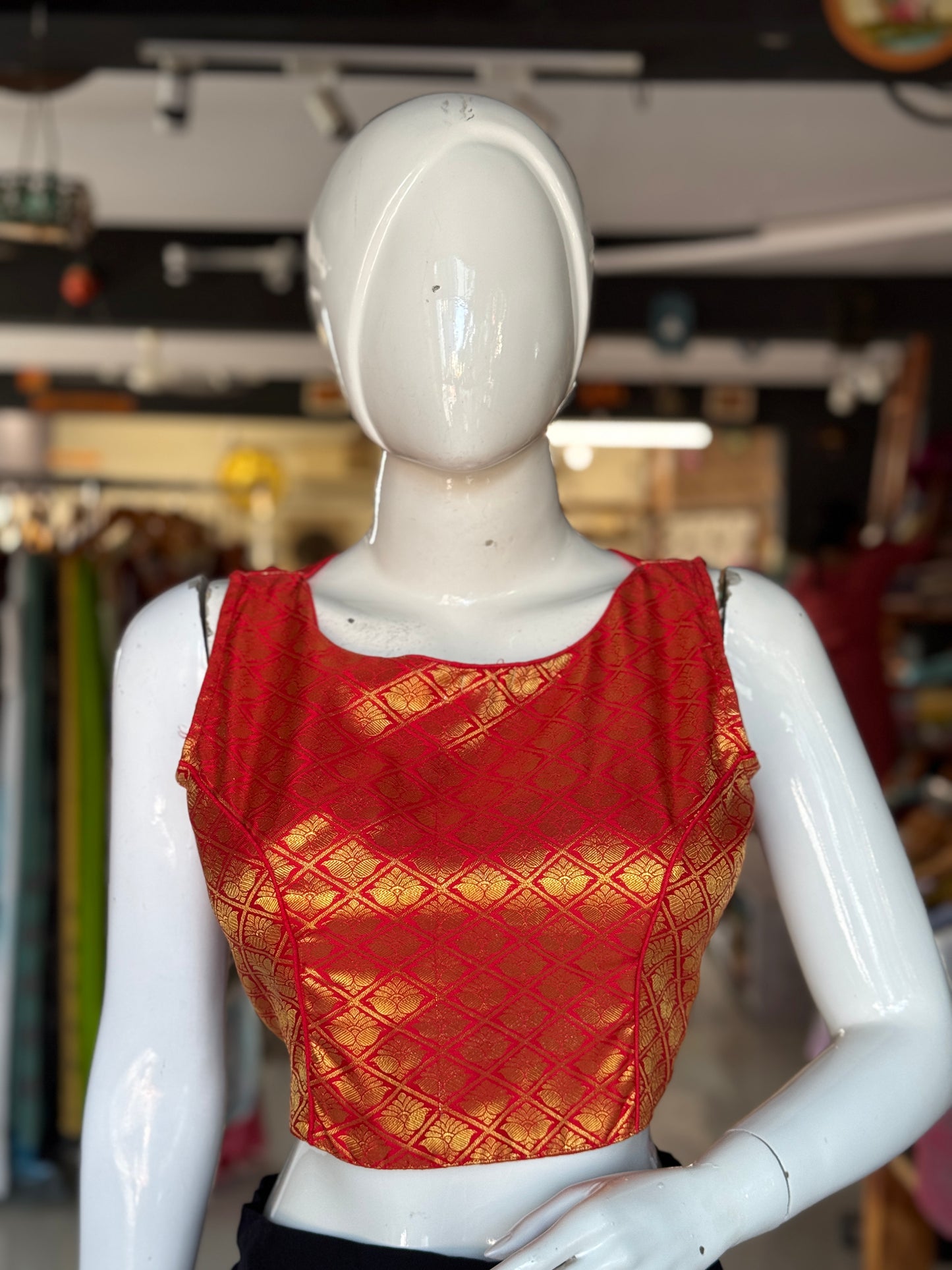 Red and gold brocade sleeveless blouse with high back