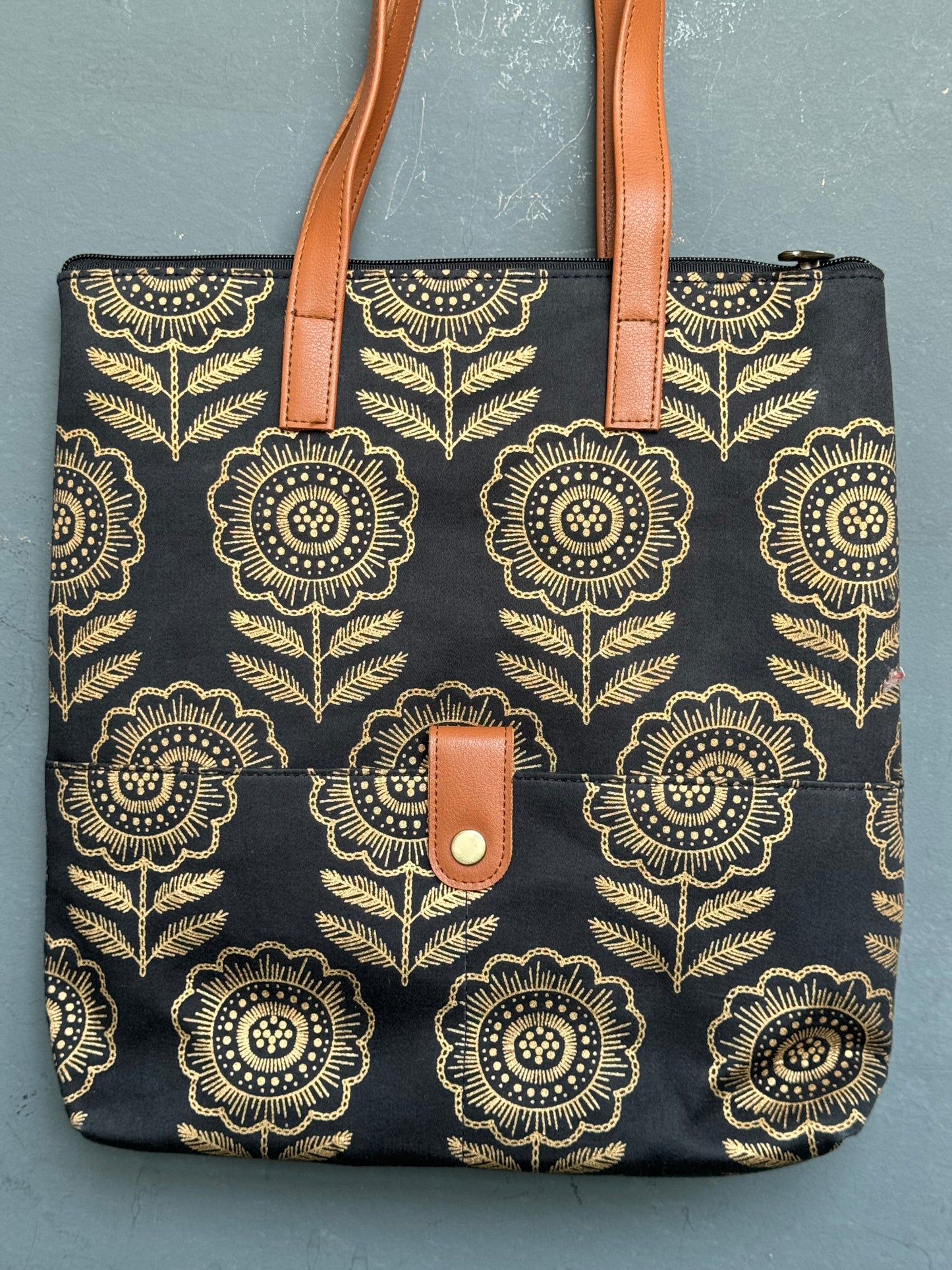 Black and gold hand block printed, hand crafted tote bag with front pocket