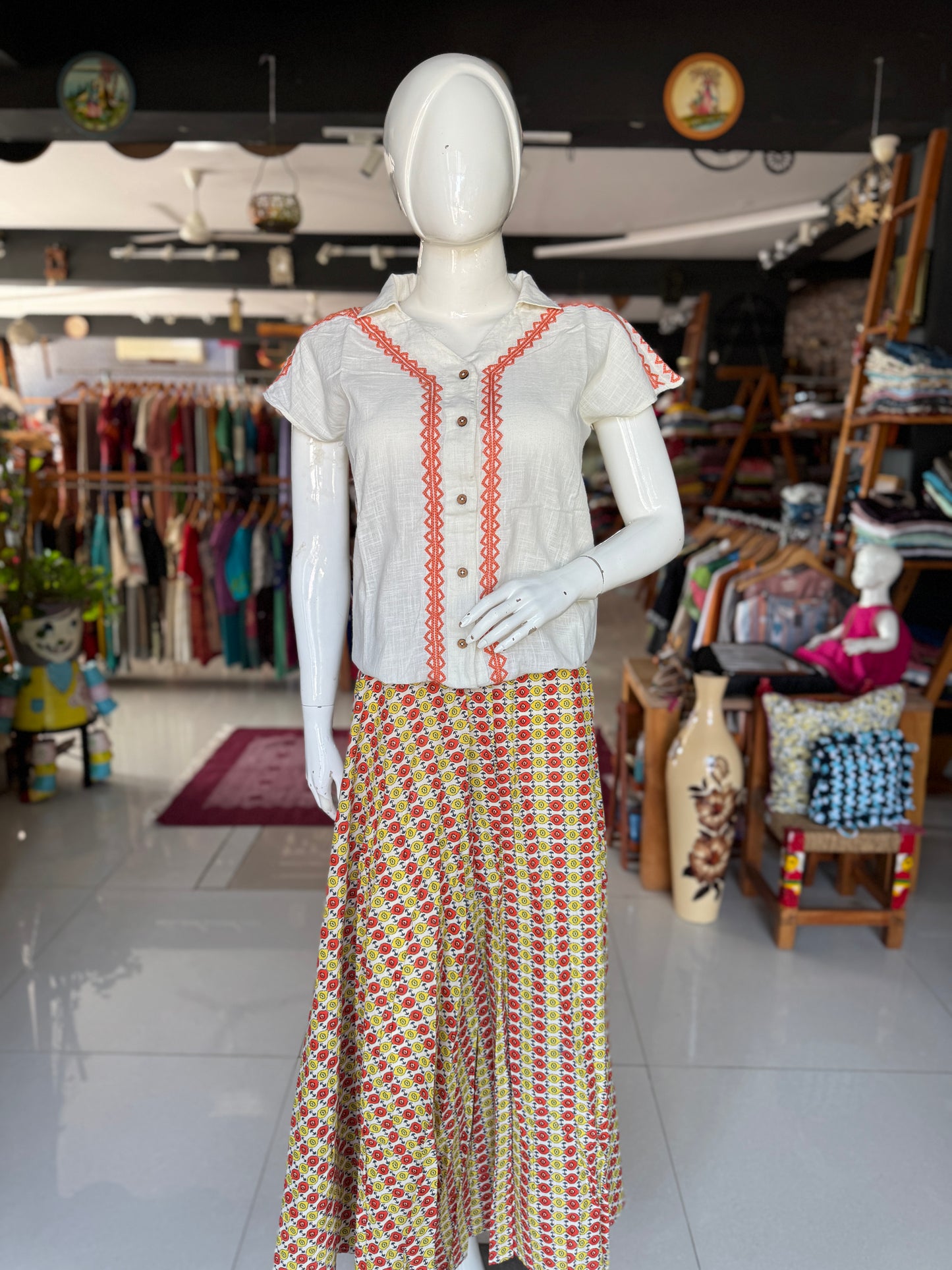 Off white handwoven cotton shirt with hand embroidery and elastic hem