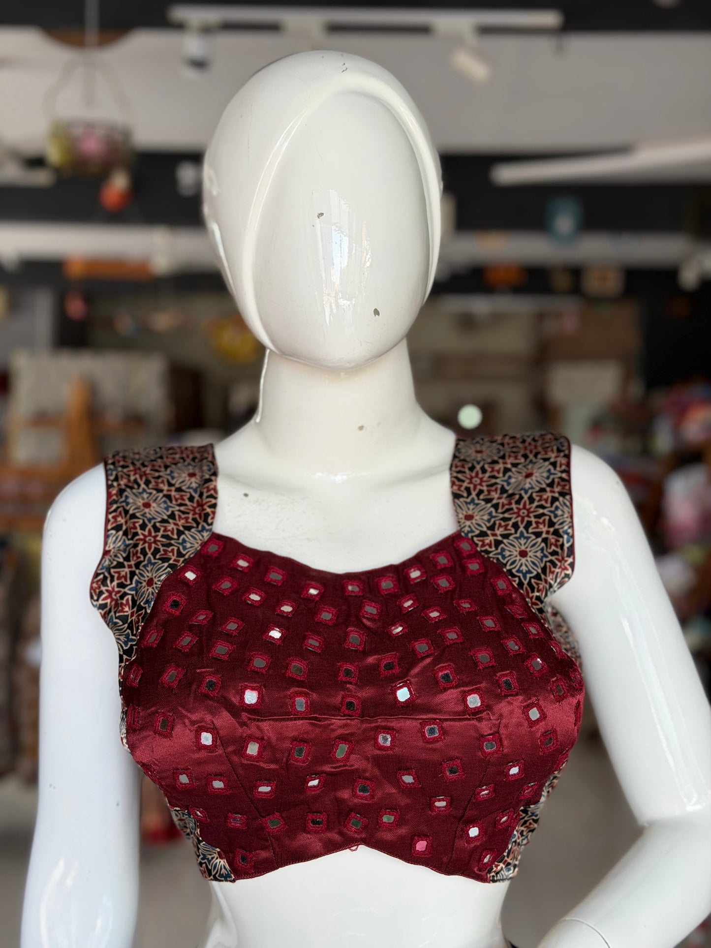 Ajrakh handblock printed Mashru sleeveless blouse with mirror embroidery - click to see colors