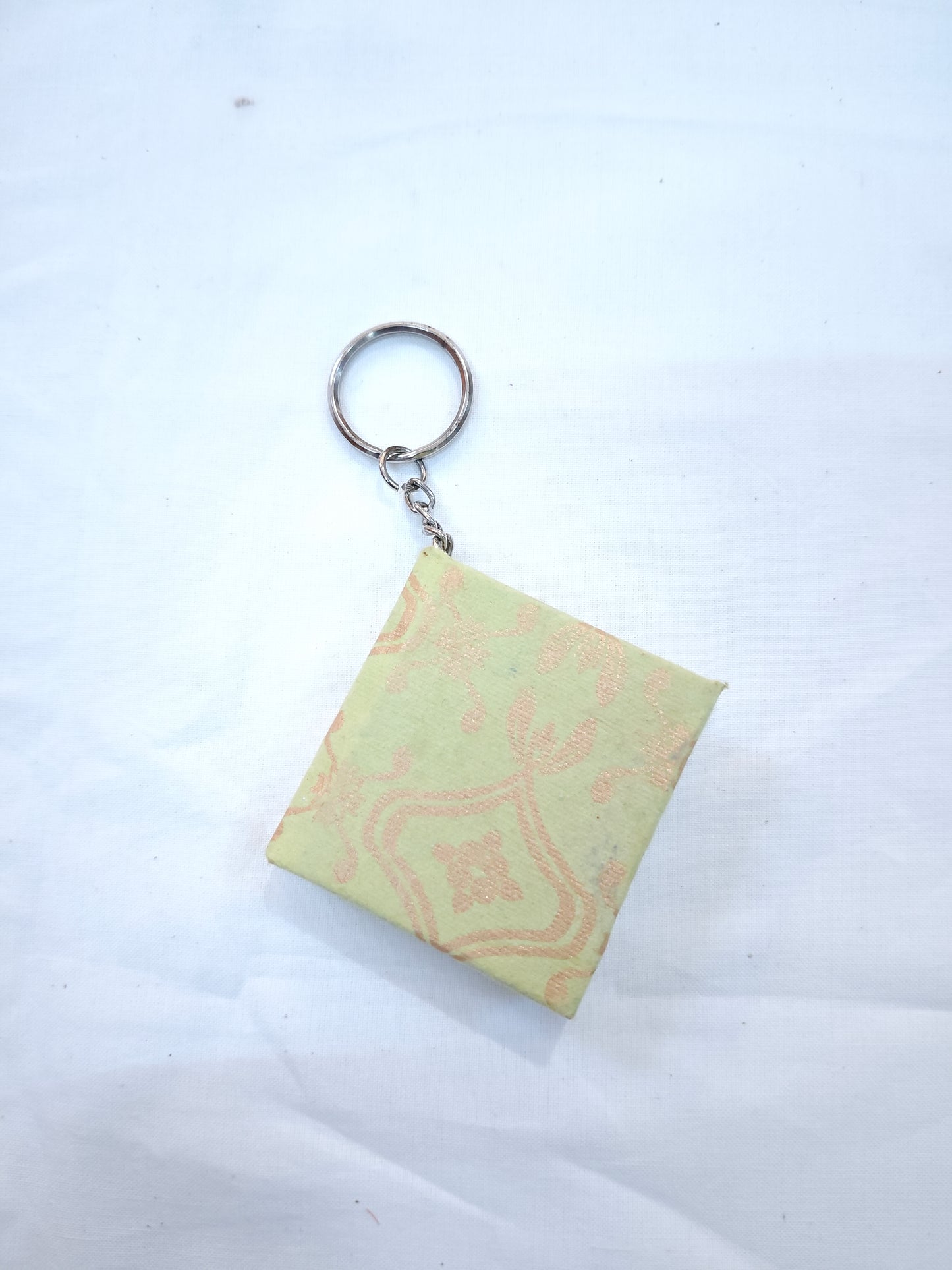 Key ring with small hand made paper notebook