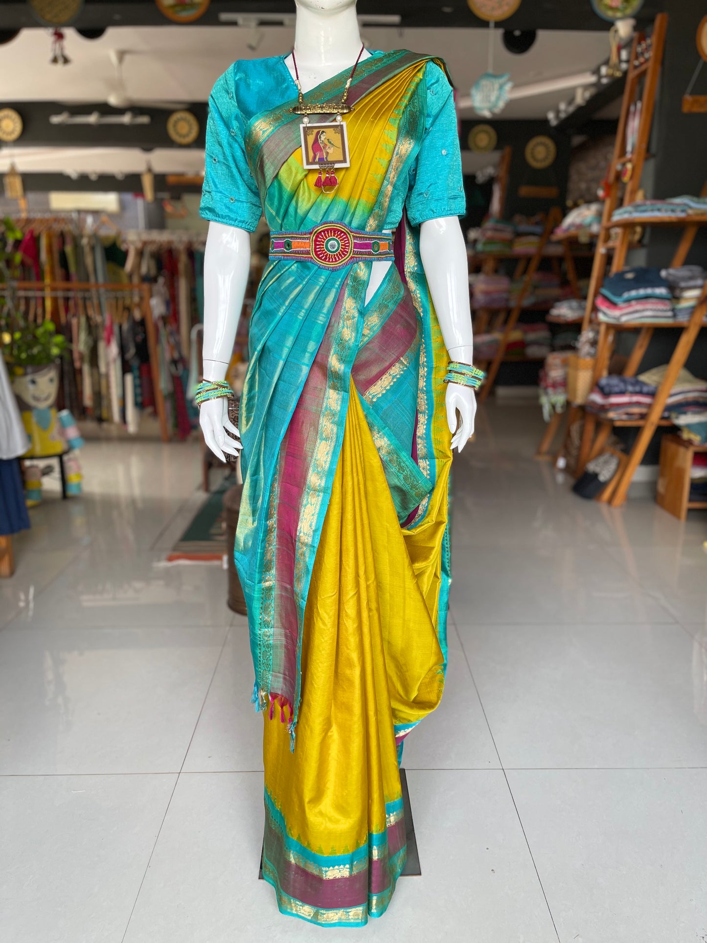 Beautiful mustard and green combination pure silk handwoven Gadwal saree with temple borders