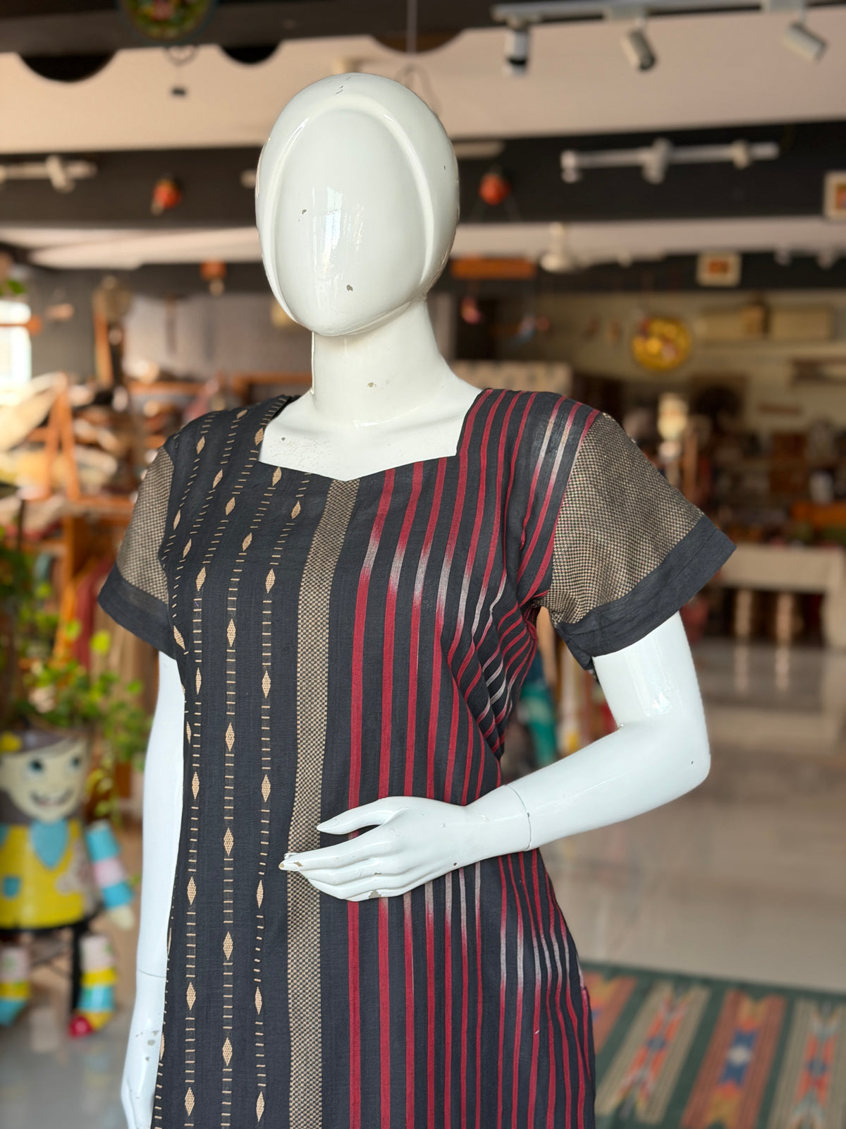 Black hand woven cotton straight kurti with beige and red Ikat designs