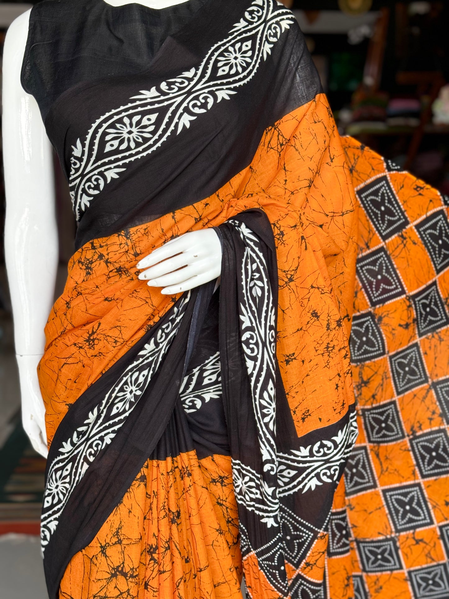 Orange and black hand block print soft mul saree