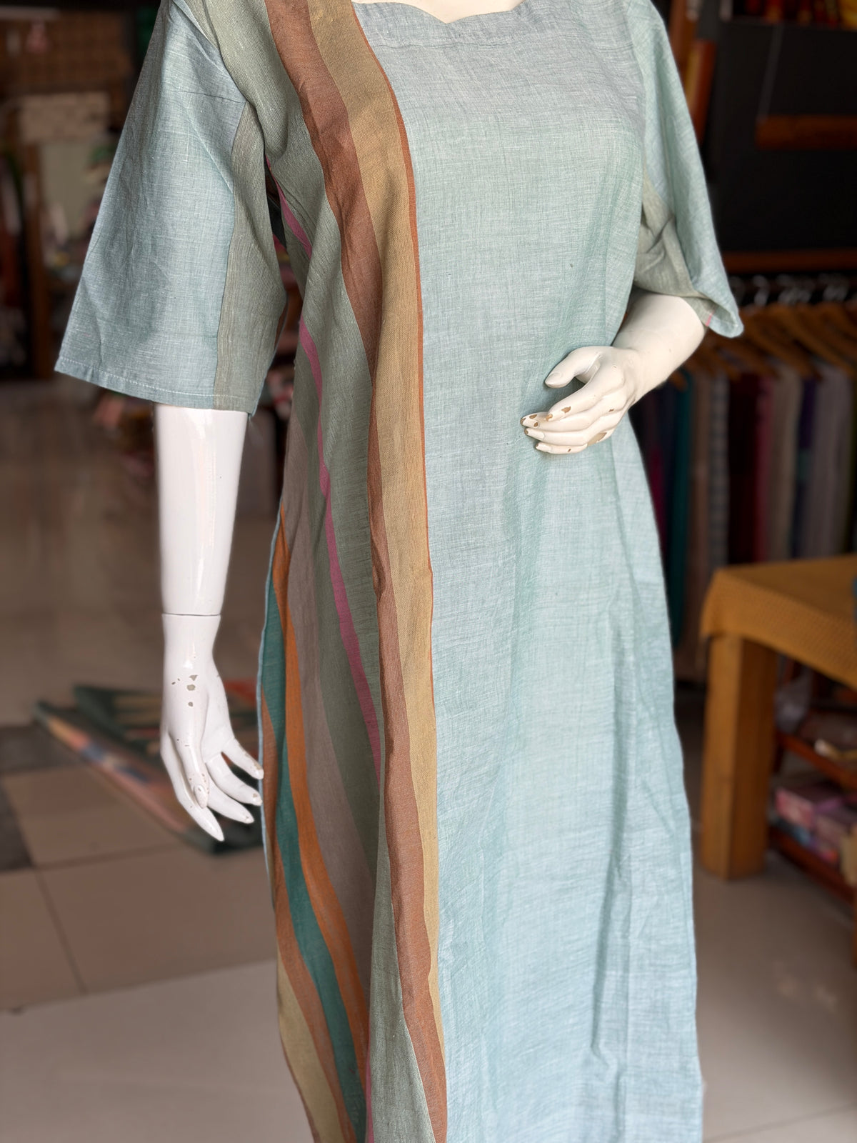 Green handloom cotton dress with hand woven kala cotton stripes on one side