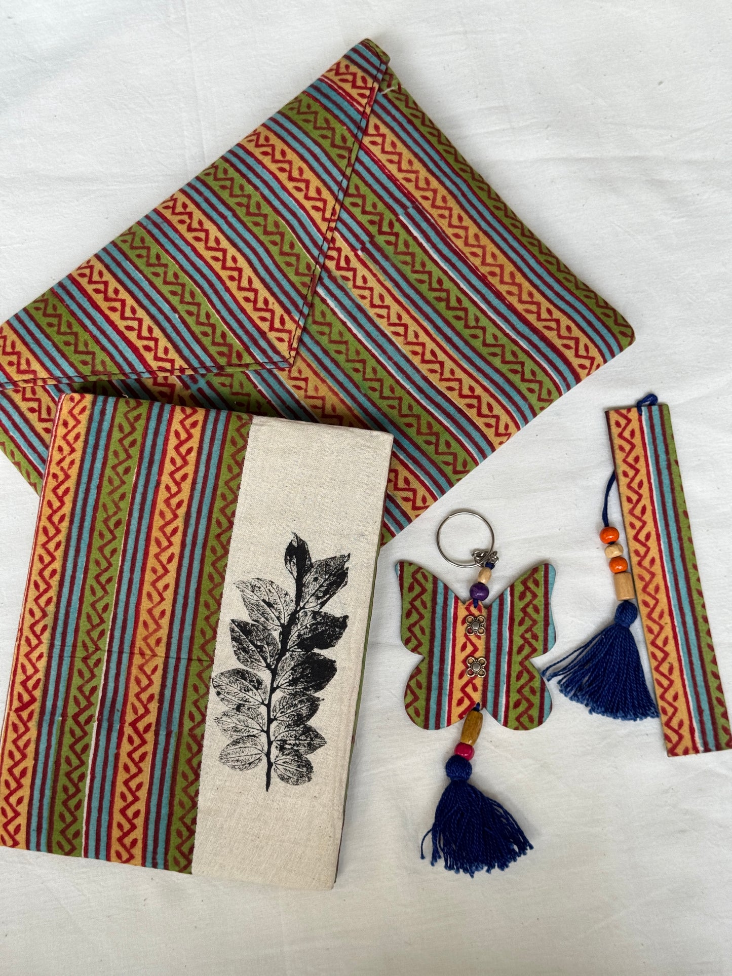 Handmade paper notebook with eco leaf printed fabric cover, hand crafted bookmark, key ring / charm and a container pouch set