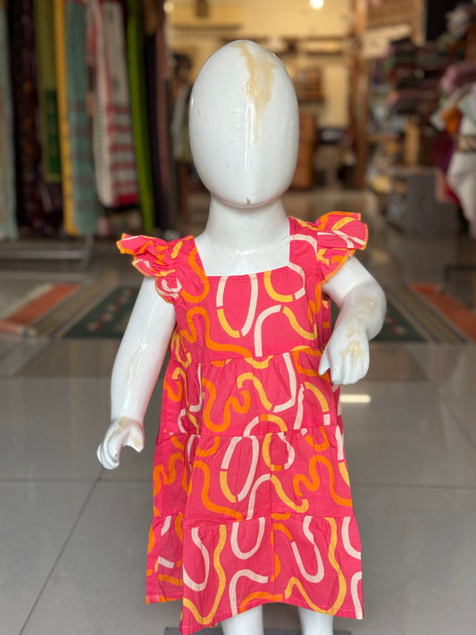 Warm salmon peach printed frock for girls