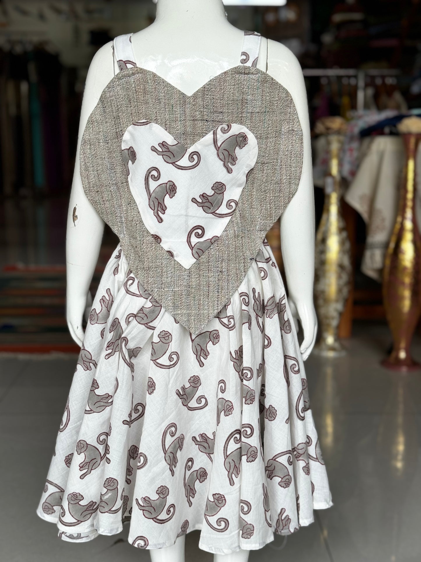 White monkeys hand block printed flared umbrella designer frock with handwoven grey heart yoke