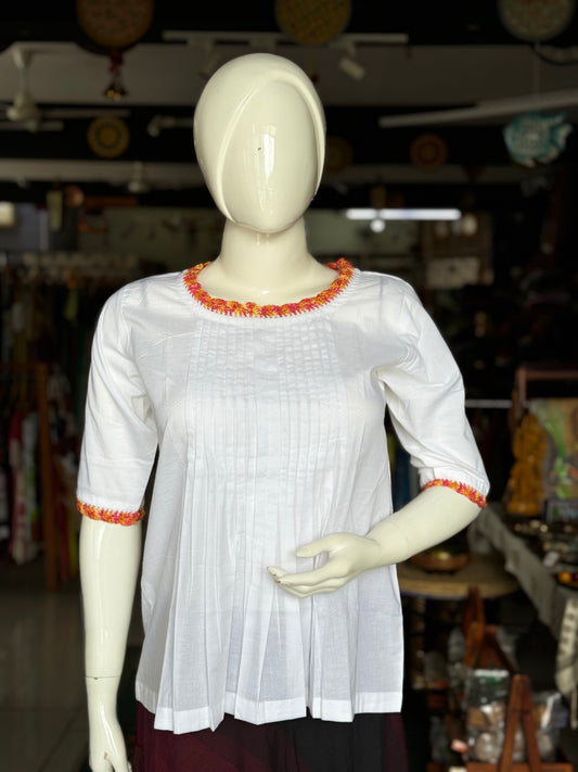 White pin-tucks cotton top with hand crocheted neck and sleeves detailing