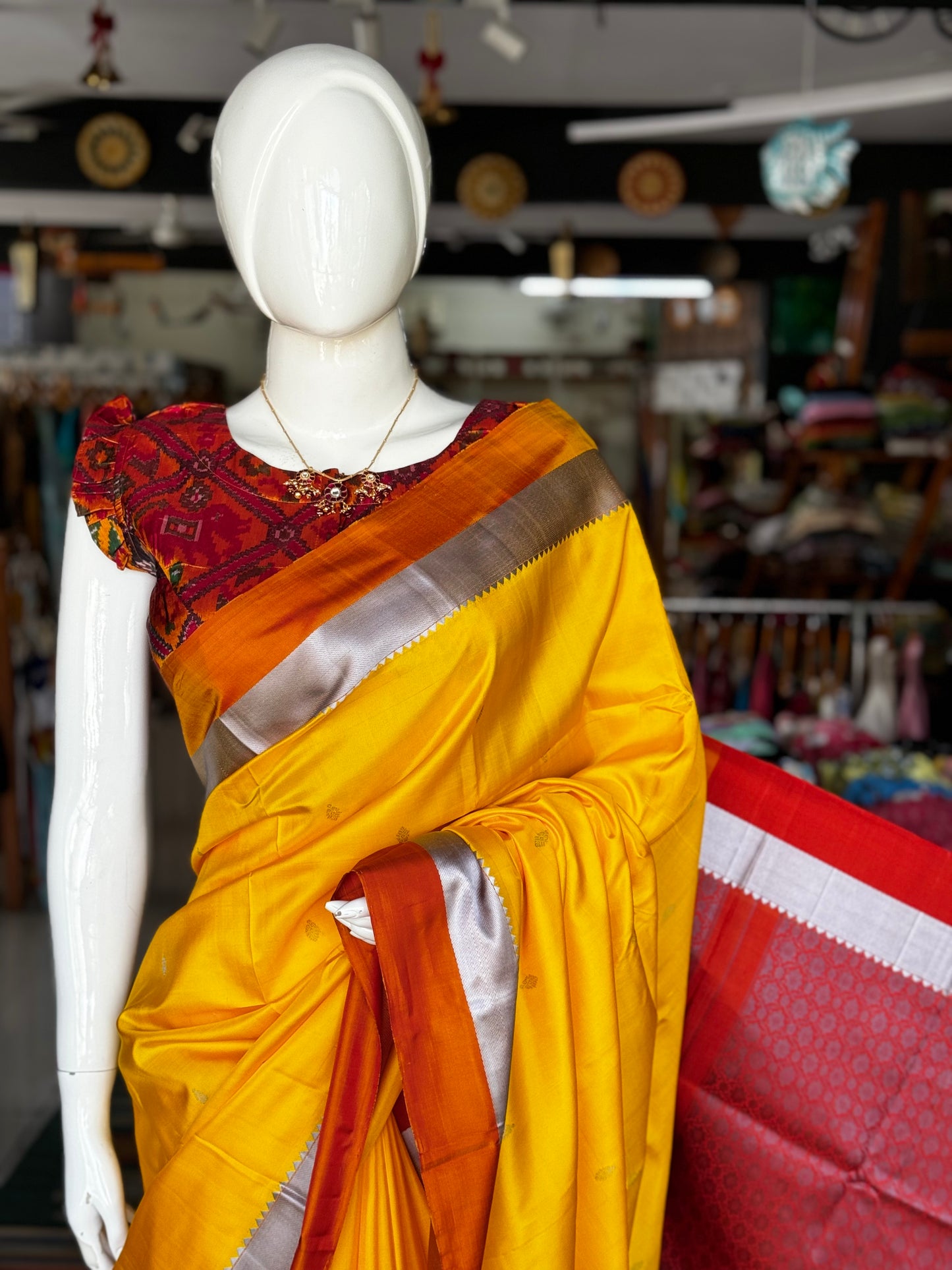 Haldi yellow pure silk Kodiyala handloom saree with all over gold butis and silver katan border