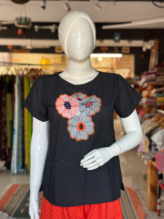 Black cotton top with hand embroidery on the front