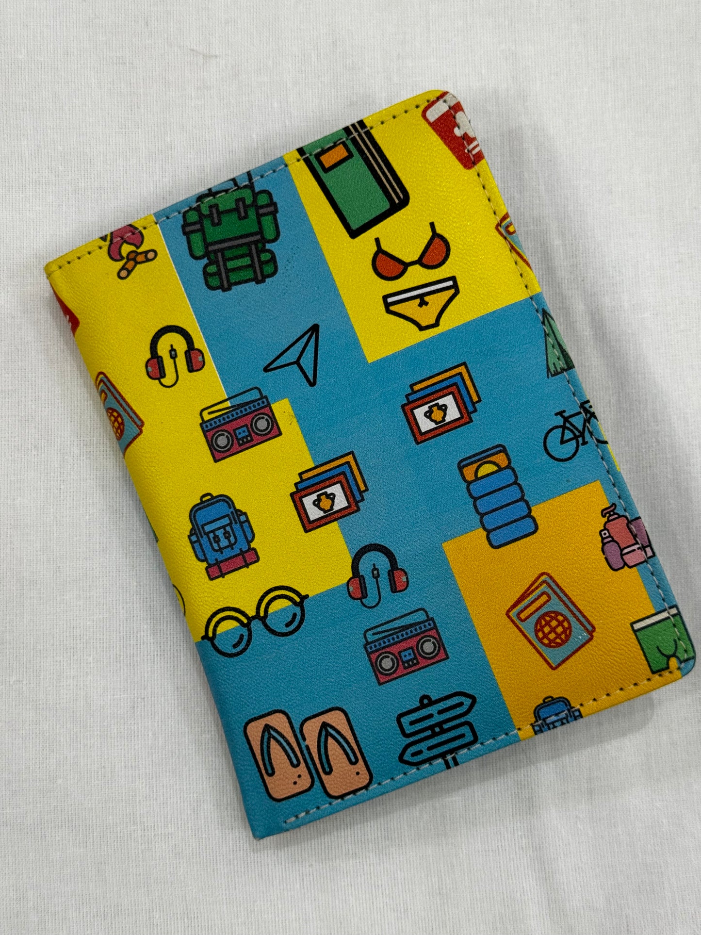 Quirky prints passport holder with slots for cards and cash