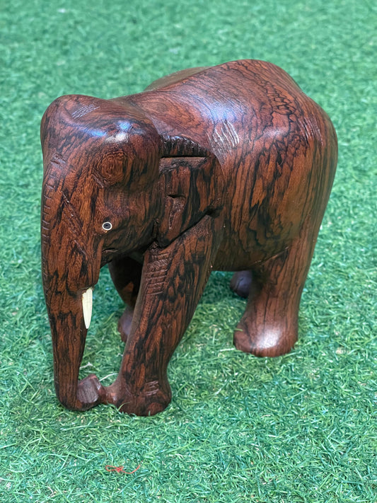 Solid rose wood hand carved wooden elephant decor with beautiful wooden grains patterns