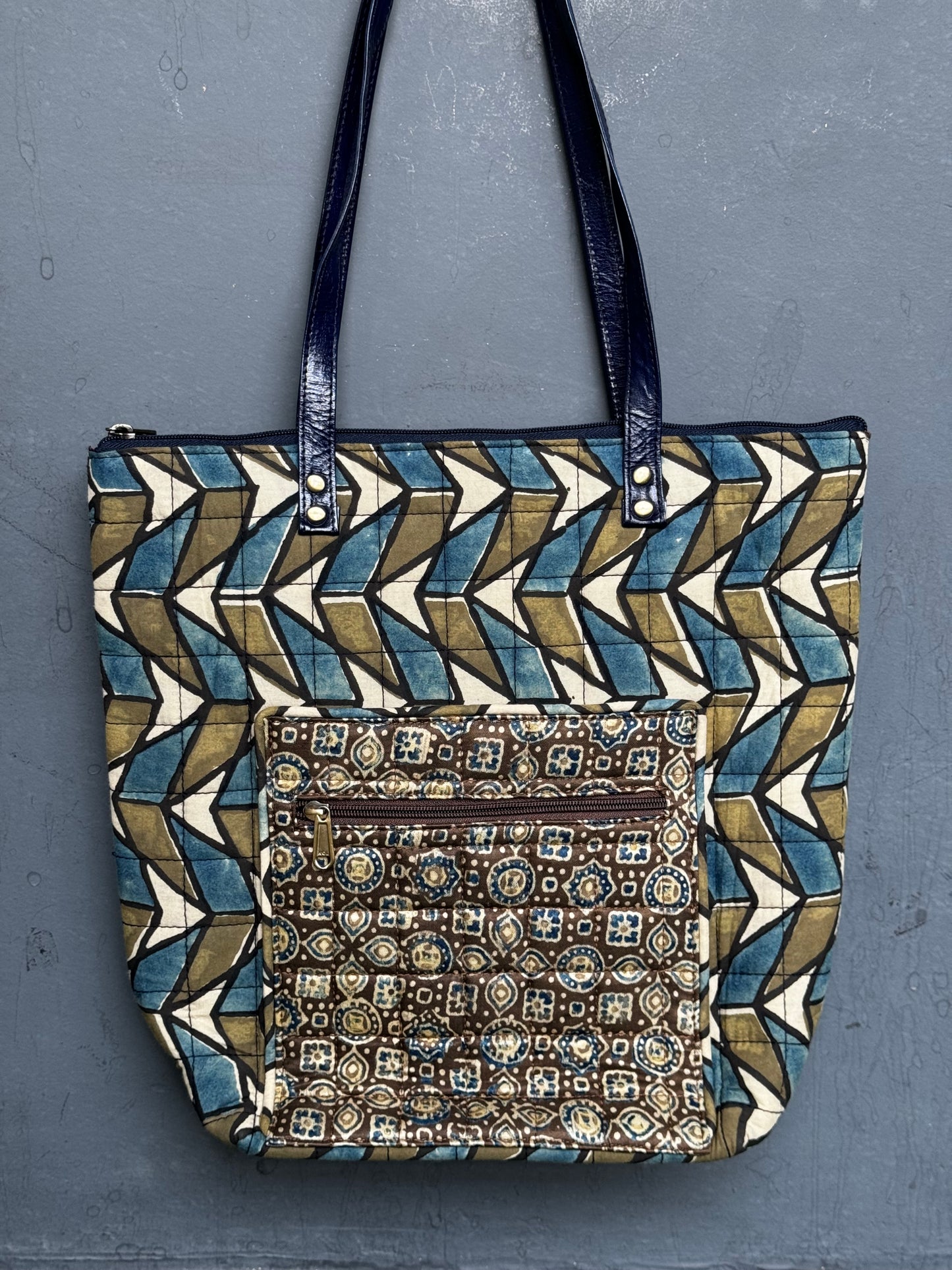 Quilted hand block printed, hand crafted fabric tote bag with front pocket and leather handles