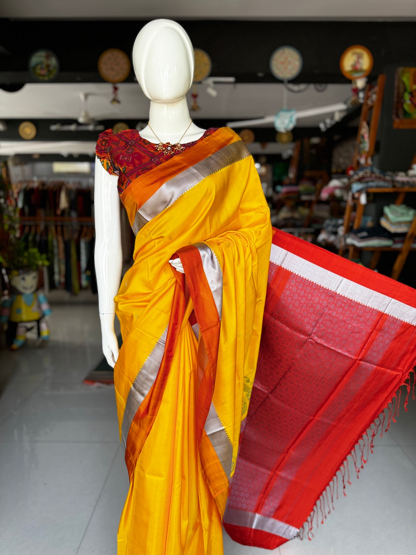 Haldi yellow pure silk Kodiyala handloom saree with all over gold butis and silver katan border