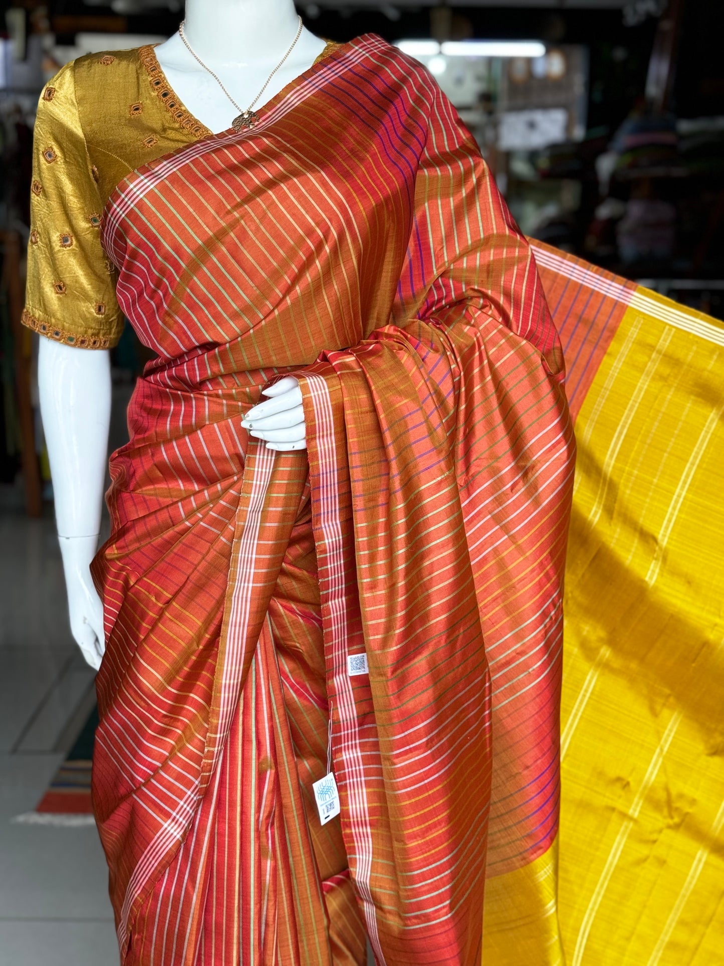 Orange pure silk handloom kanjeevaram pattu saree with multi colored stripes all over