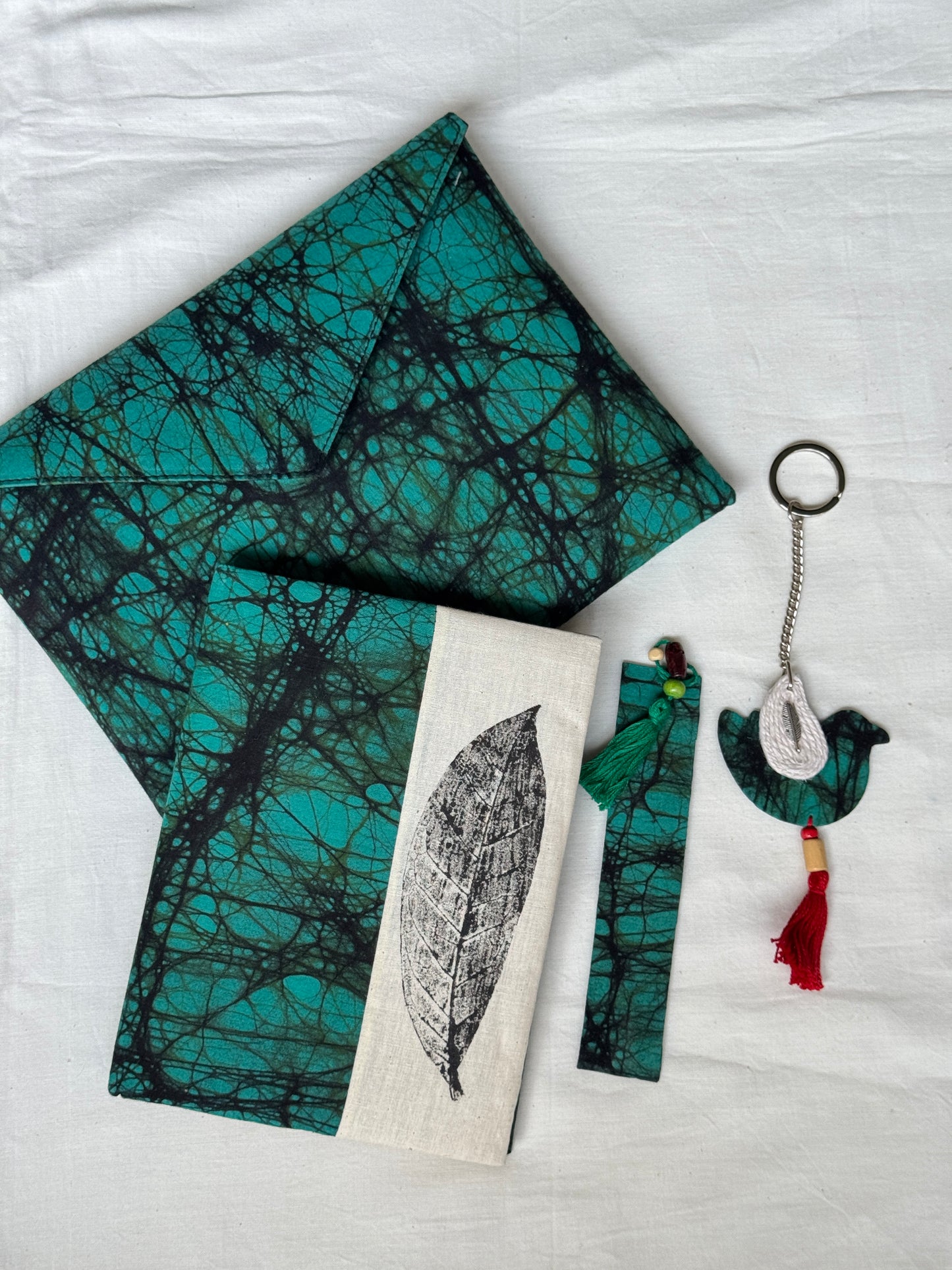 Handmade paper notebook with eco leaf printed fabric cover, hand crafted bookmark, key ring / charm and a container pouch set