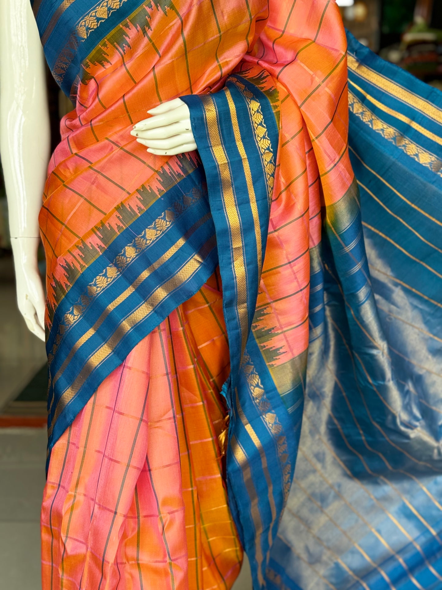 Peach and blue pure silk handwoven Gadwal checks saree with temple border