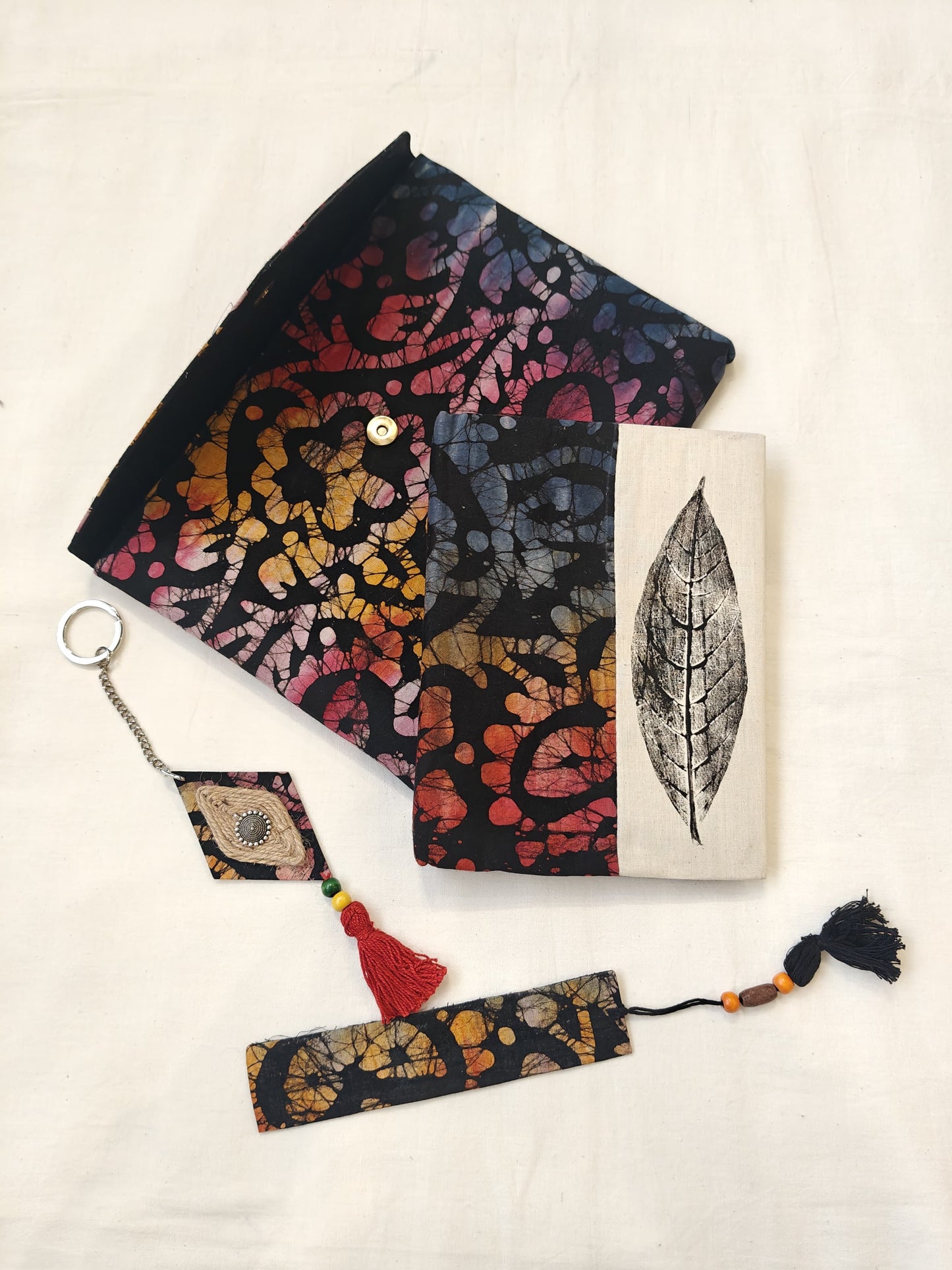 Handmade paper notebook with eco leaf printed fabric cover, hand crafted bookmark, key ring / charm and a container pouch set