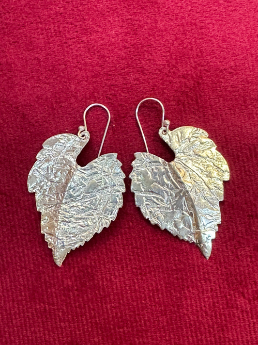 Embossed silver leaf shaped hooks earrings in 92.5 sterling silver