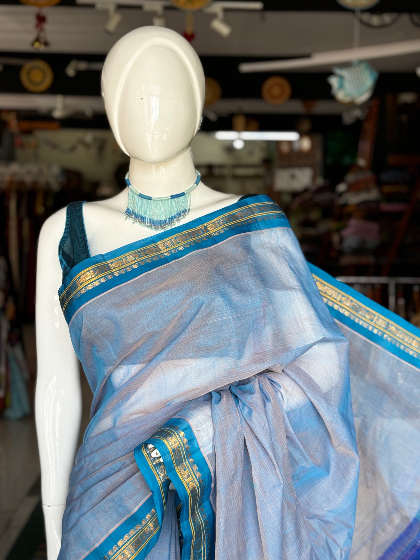 Blue handwoven Gadwal cotton saree with copper sulphate blue pure silk pallu and borders