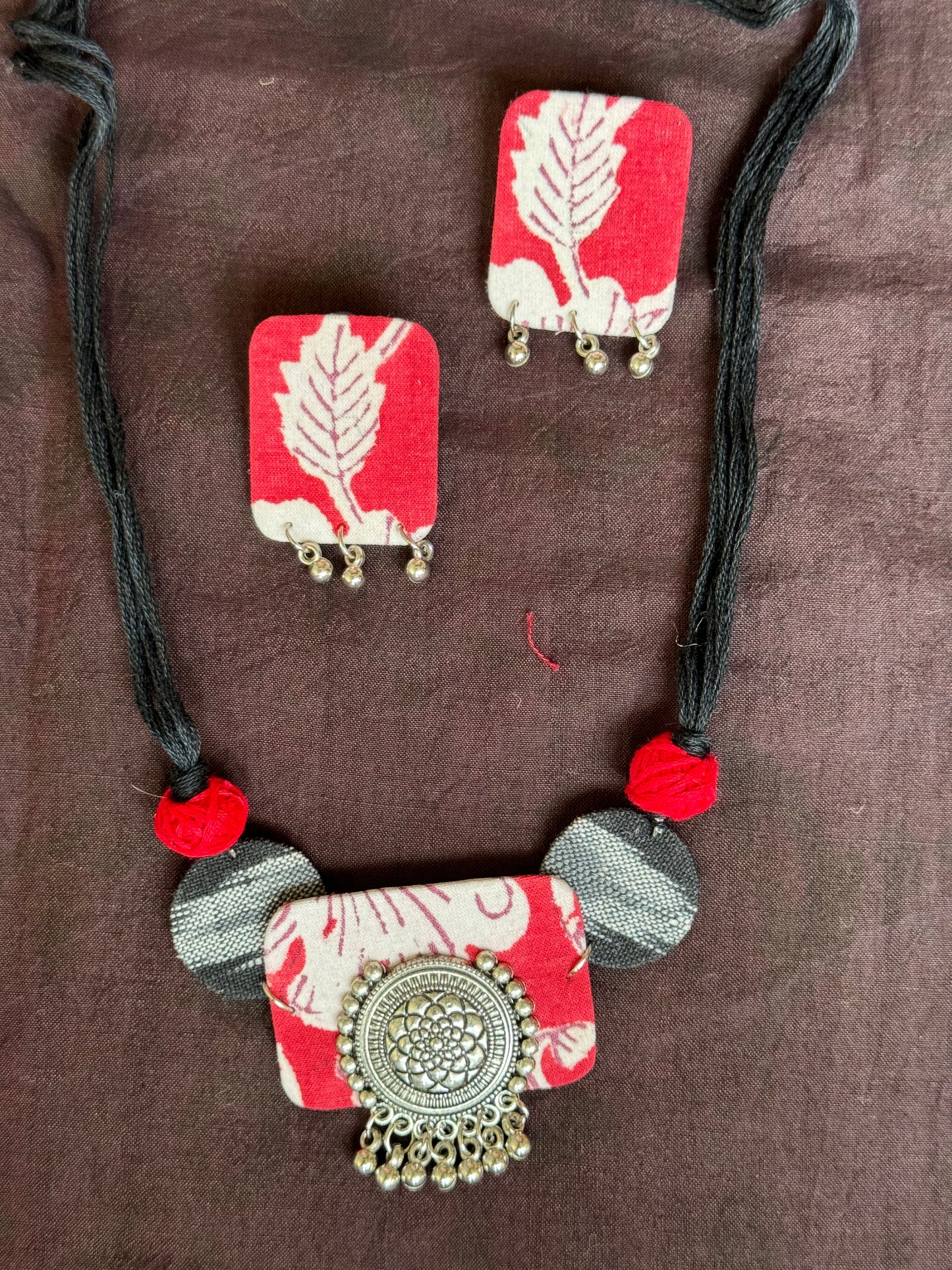 Hand block printed cotton fabric and oxidised silver handcrafted choker neckpiece and earrings set