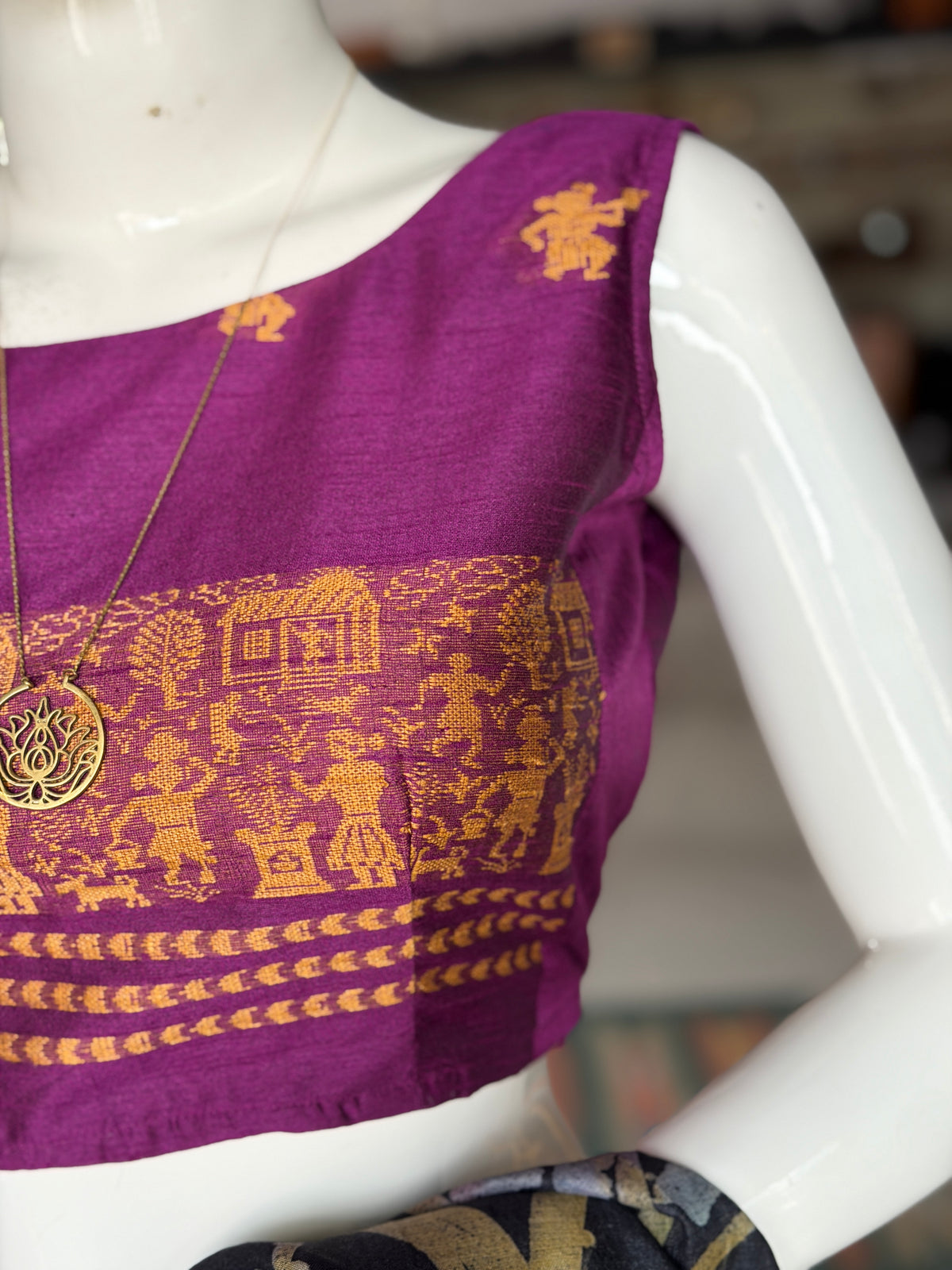 Purple handwoven raw silk sleeveless blouse with golden village motifs