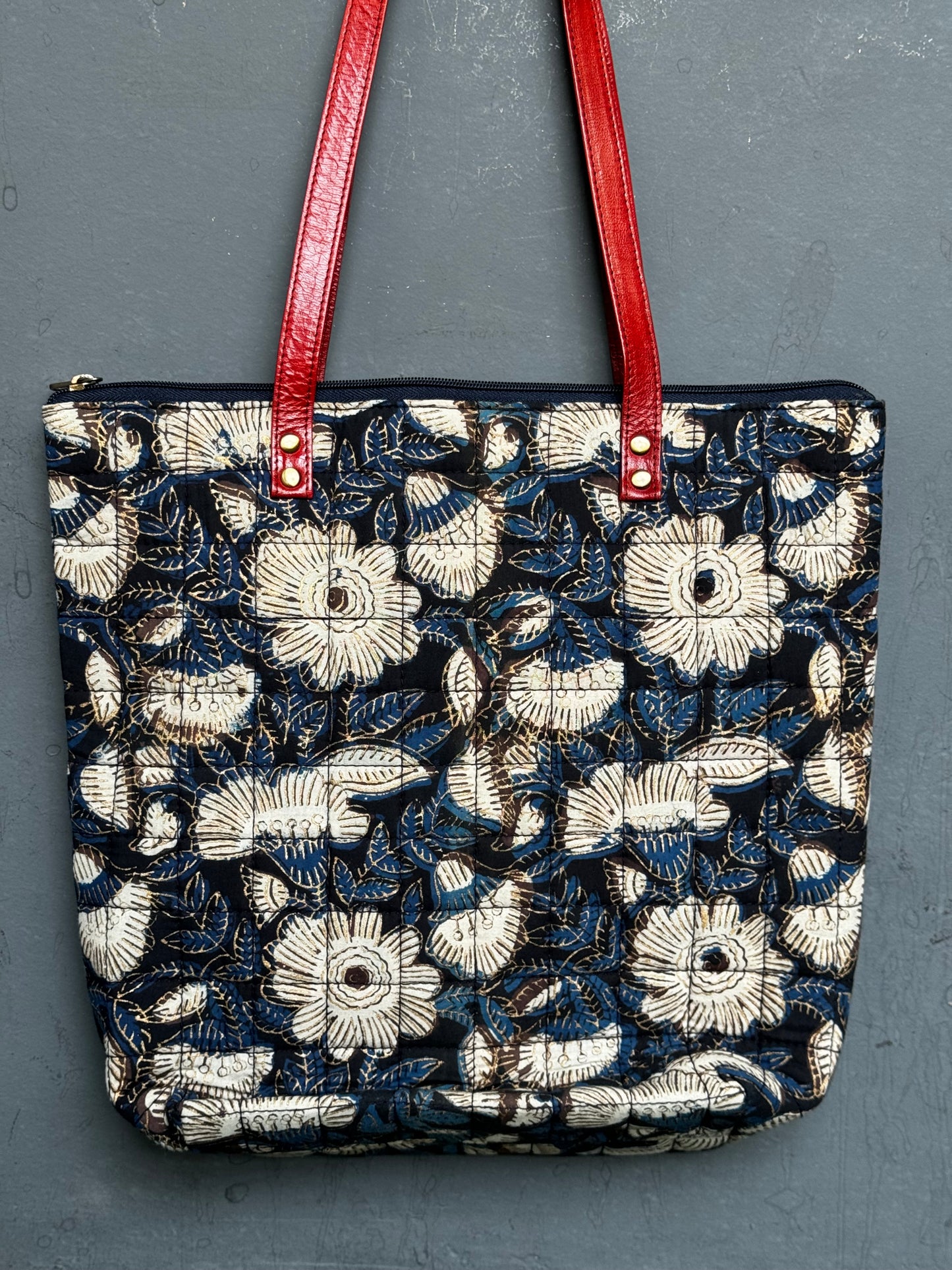 Quilted hand block printed, hand crafted fabric tote bag with front pocket and leather handles