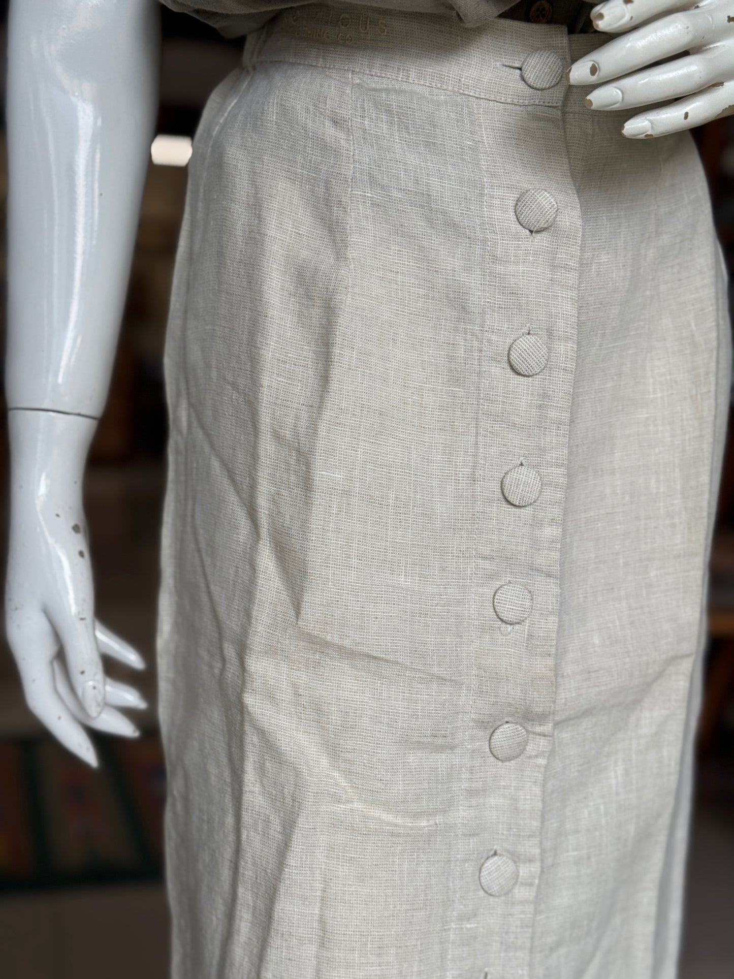 Women’s formal calf length skirt with elastic waist and front buttons - colors available