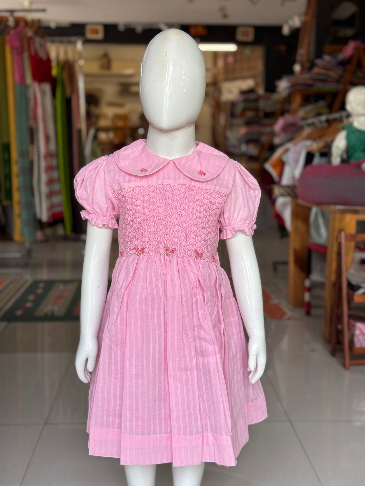 Light pink stripes hand embroidered smocking cotton frock for girls with collar