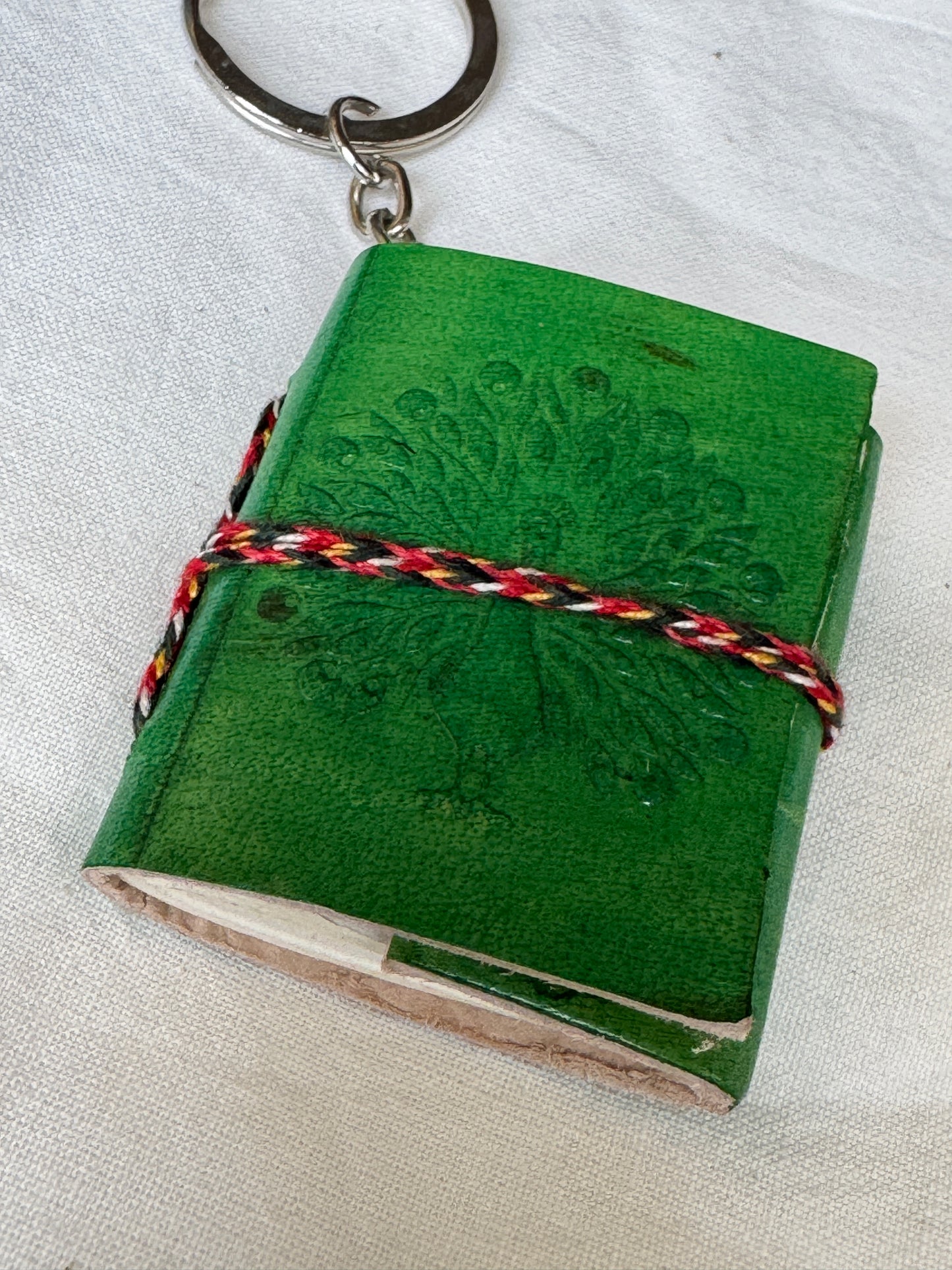 Key ring with Leather embossed handcrafted notebook with thick papers