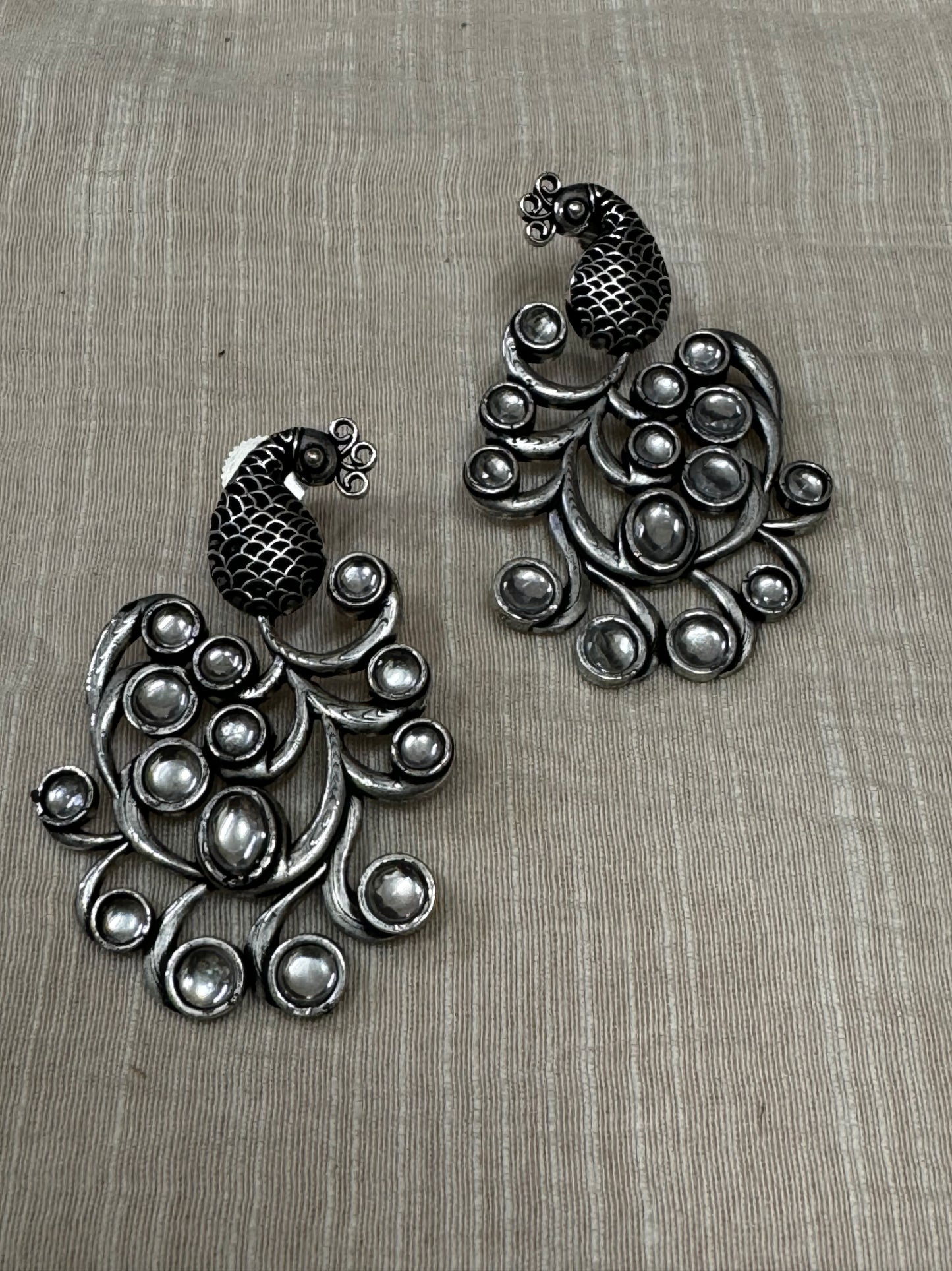 Stone studded peacock studs - earrings