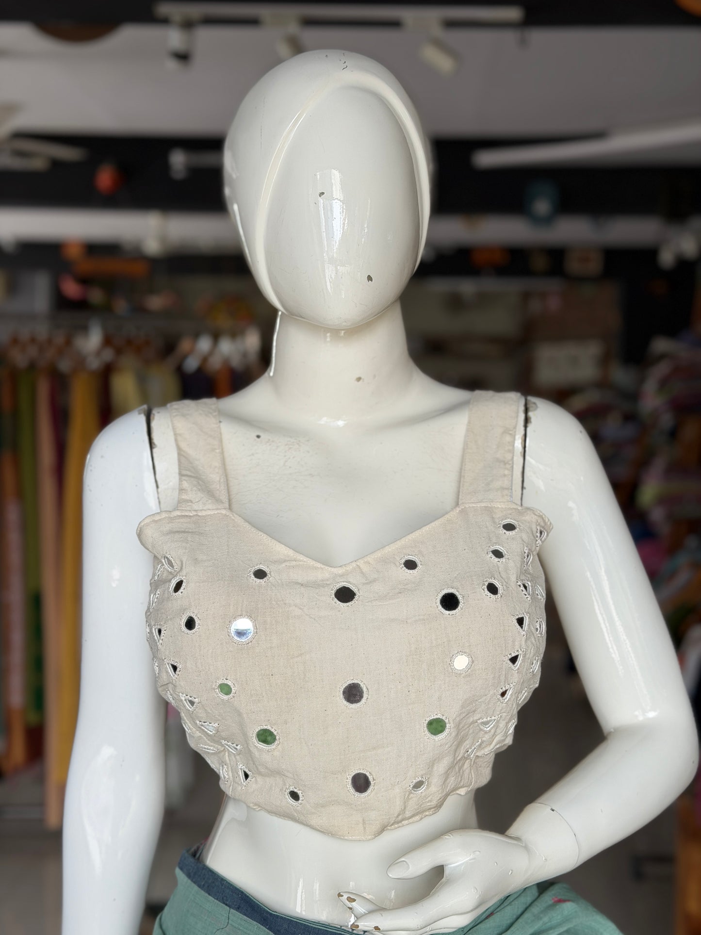 Off white kala cotton sleeveless blouse with all over colorful mirror work on front and back - adjustable back width