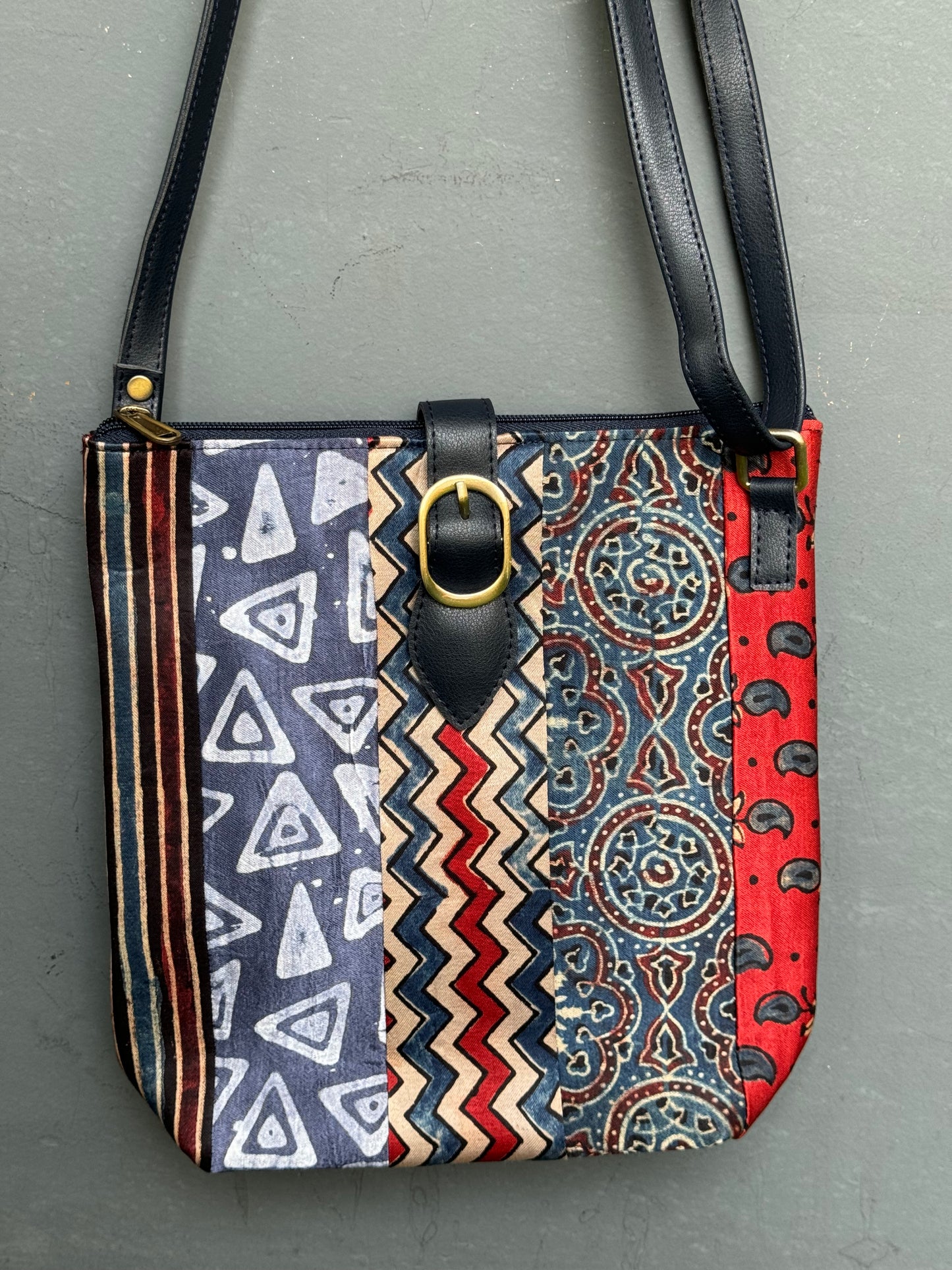 Multi colour patch work Mashru Ajrakh and Leather hand crafted sling bag