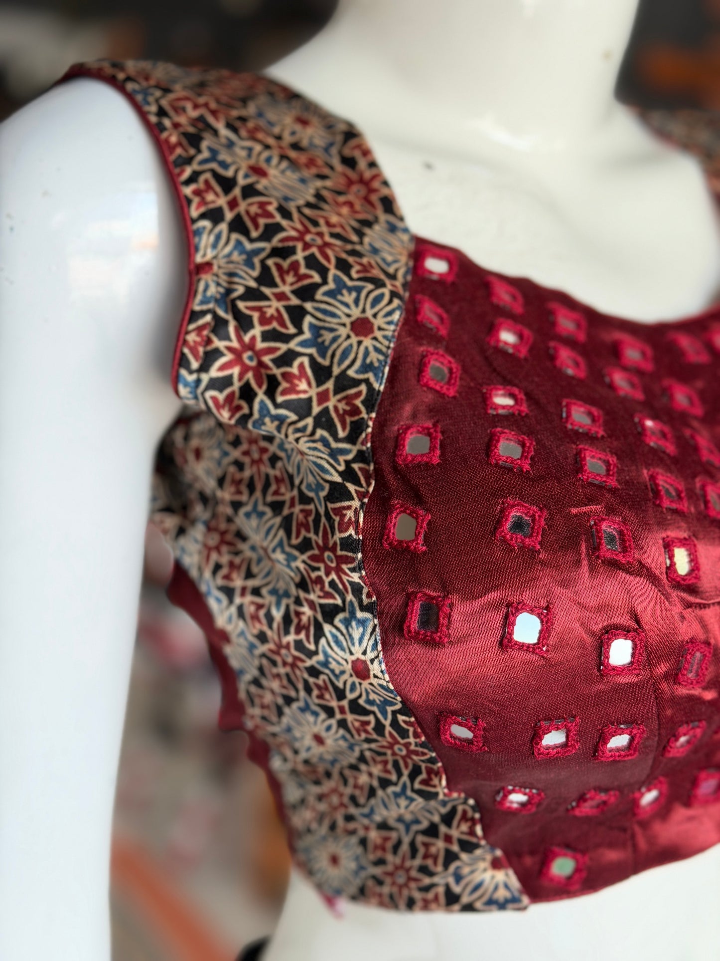 Ajrakh handblock printed Mashru sleeveless blouse with mirror embroidery - click to see colors