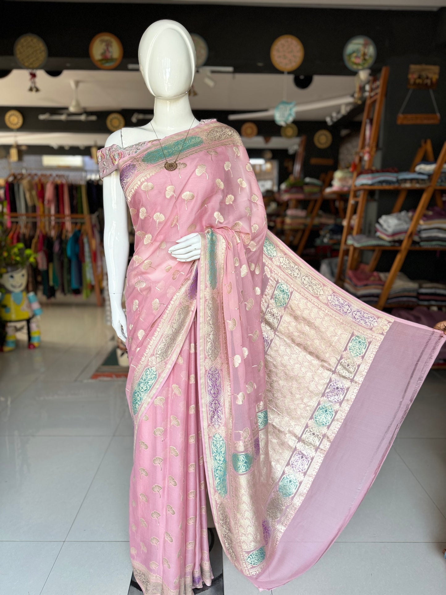 Light pink Banarasi georgette saree with colorful painted border