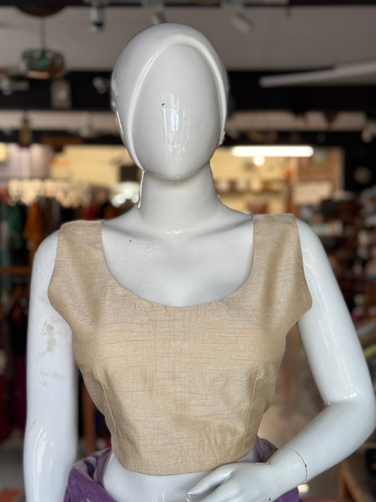Cream plain sleeveless back open silk blouse