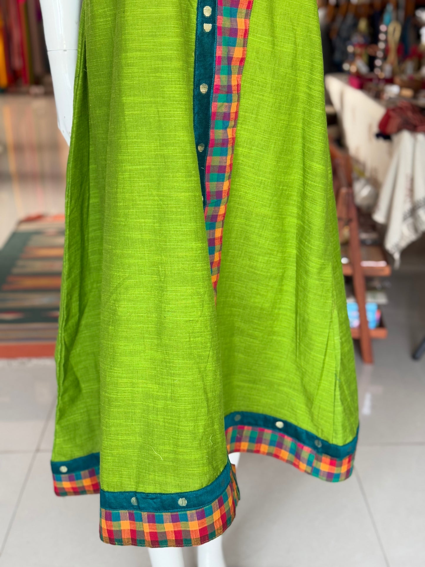 Green cotton dress with colorful madras checks and turquoise borders