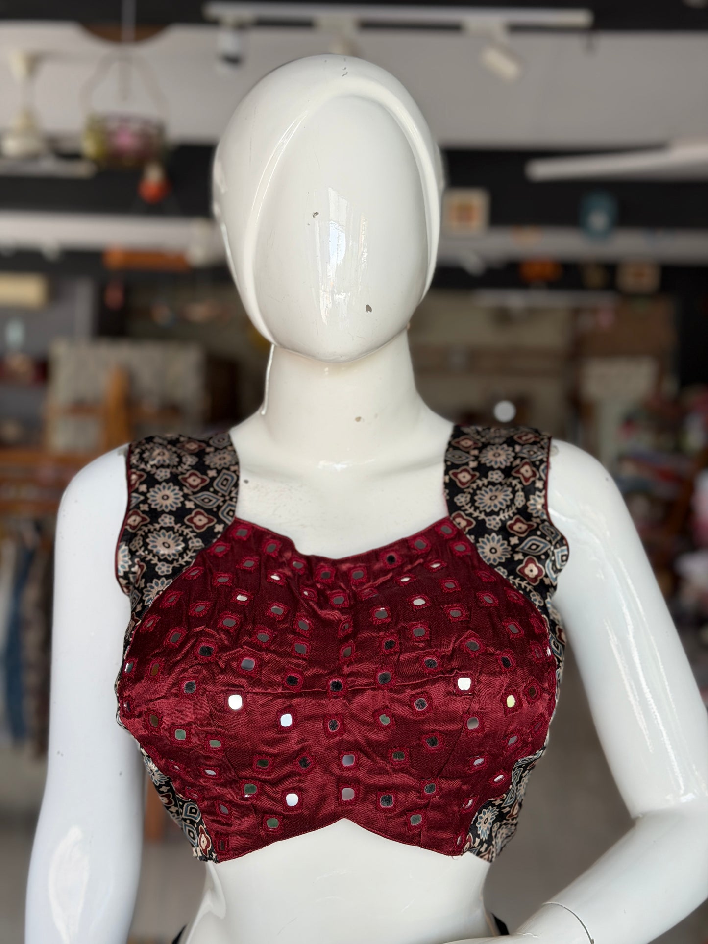Ajrakh handblock printed Mashru sleeveless blouse with mirror embroidery - click to see colors