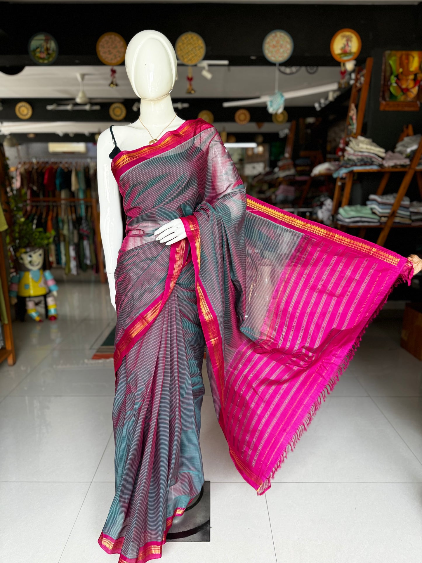 Handwoven Gadwal cotton saree with bright pink pure silk pallu and borders