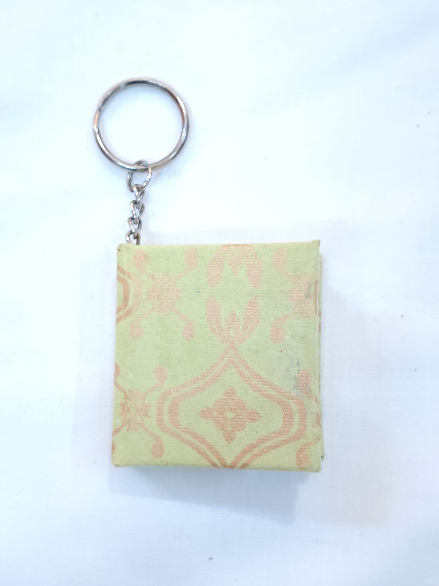 Key ring with small hand made paper notebook