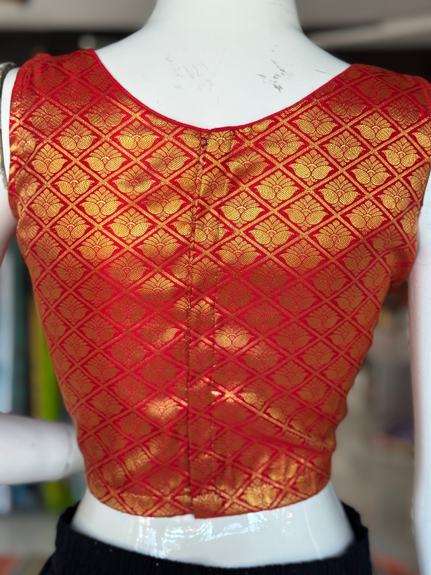 Red and gold brocade sleeveless blouse with high back