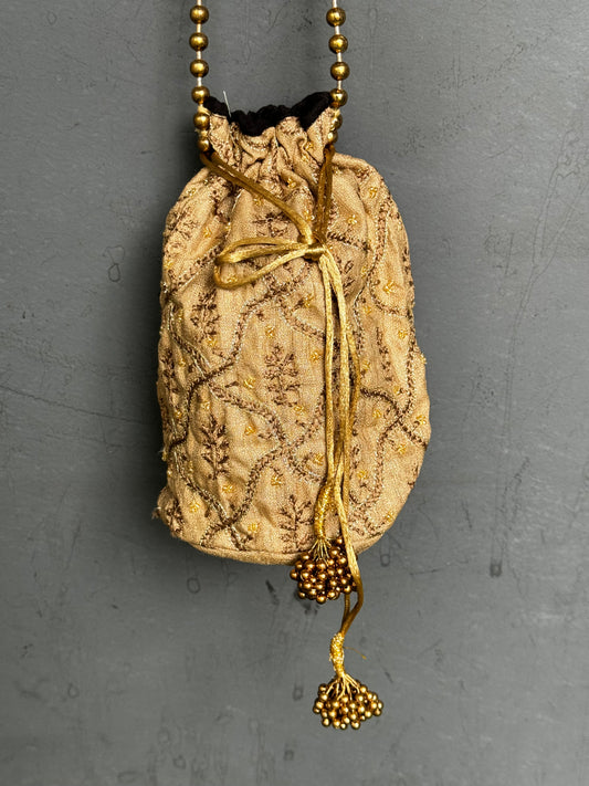 Gold Chikankari hand embroidered potli bag