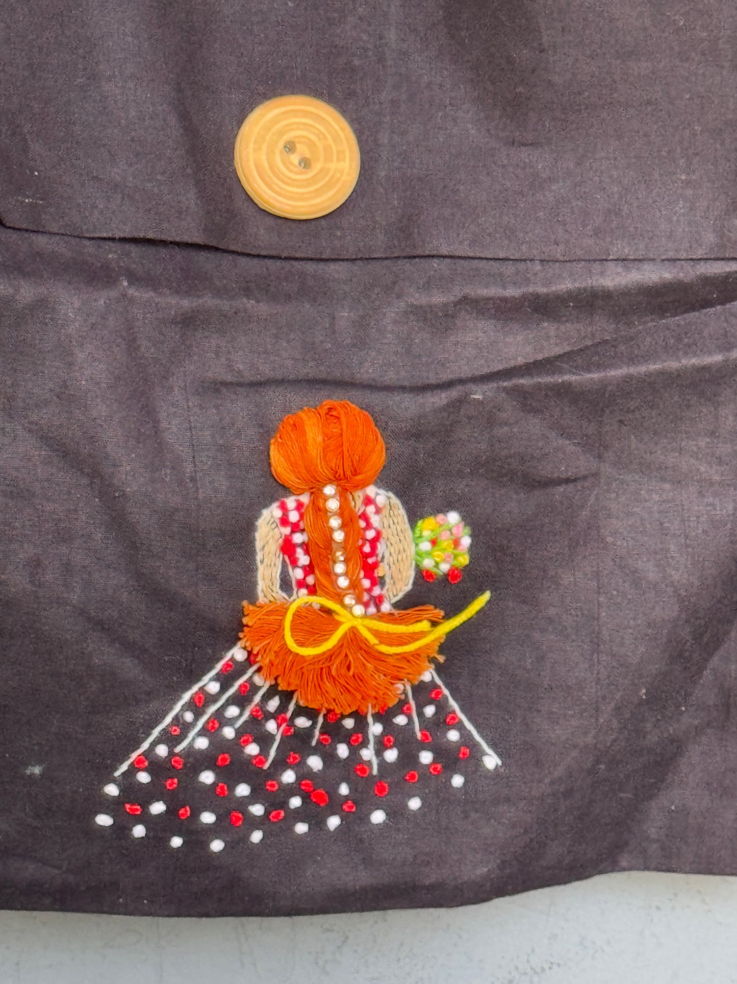 Black fabric sling bag with hand embroidered girl - velcrow closure