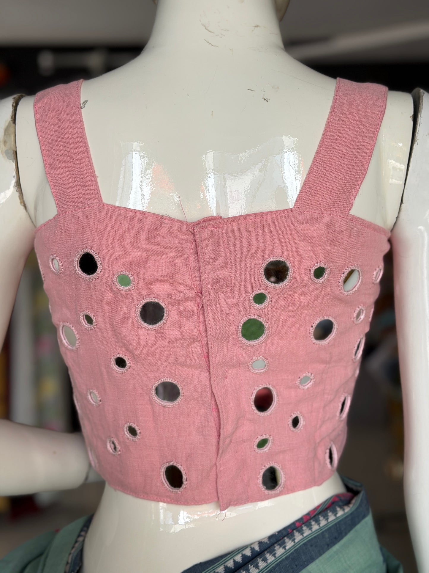 Light pink kala cotton sleeveless blouse with all over colorful mirror work on front and back