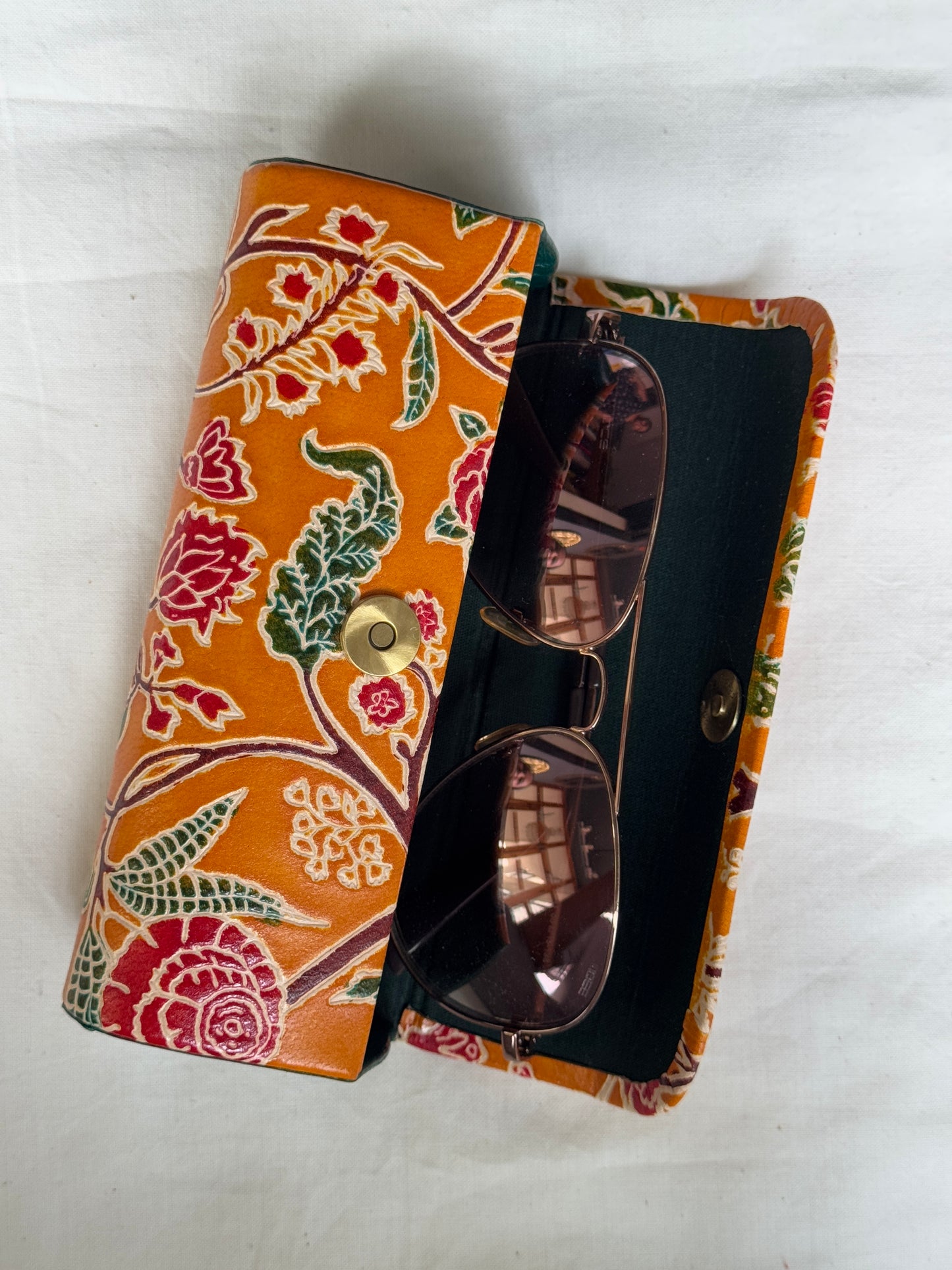 Hand embossed hand painted leather spectacles / goggles case