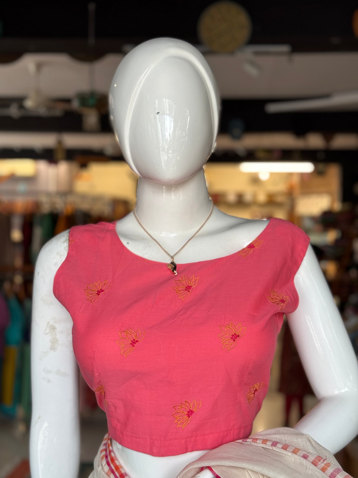 Pink cotton sleeveless blouse with floral machine embroidery - front boat neck, back v-neck