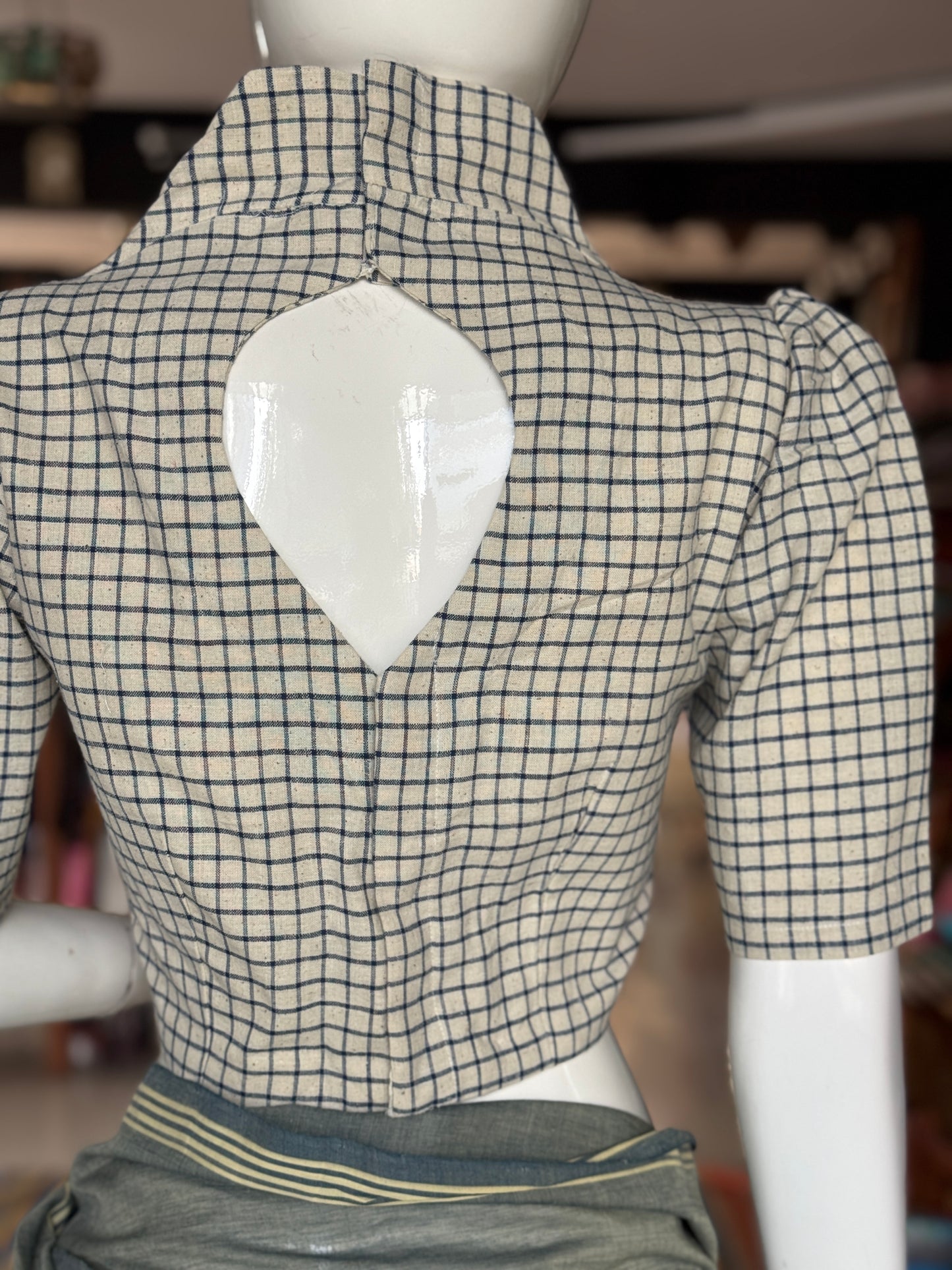 Off White n blue checks natural dyed, hand woven cotton blouse with standing collar, front tie and back hole