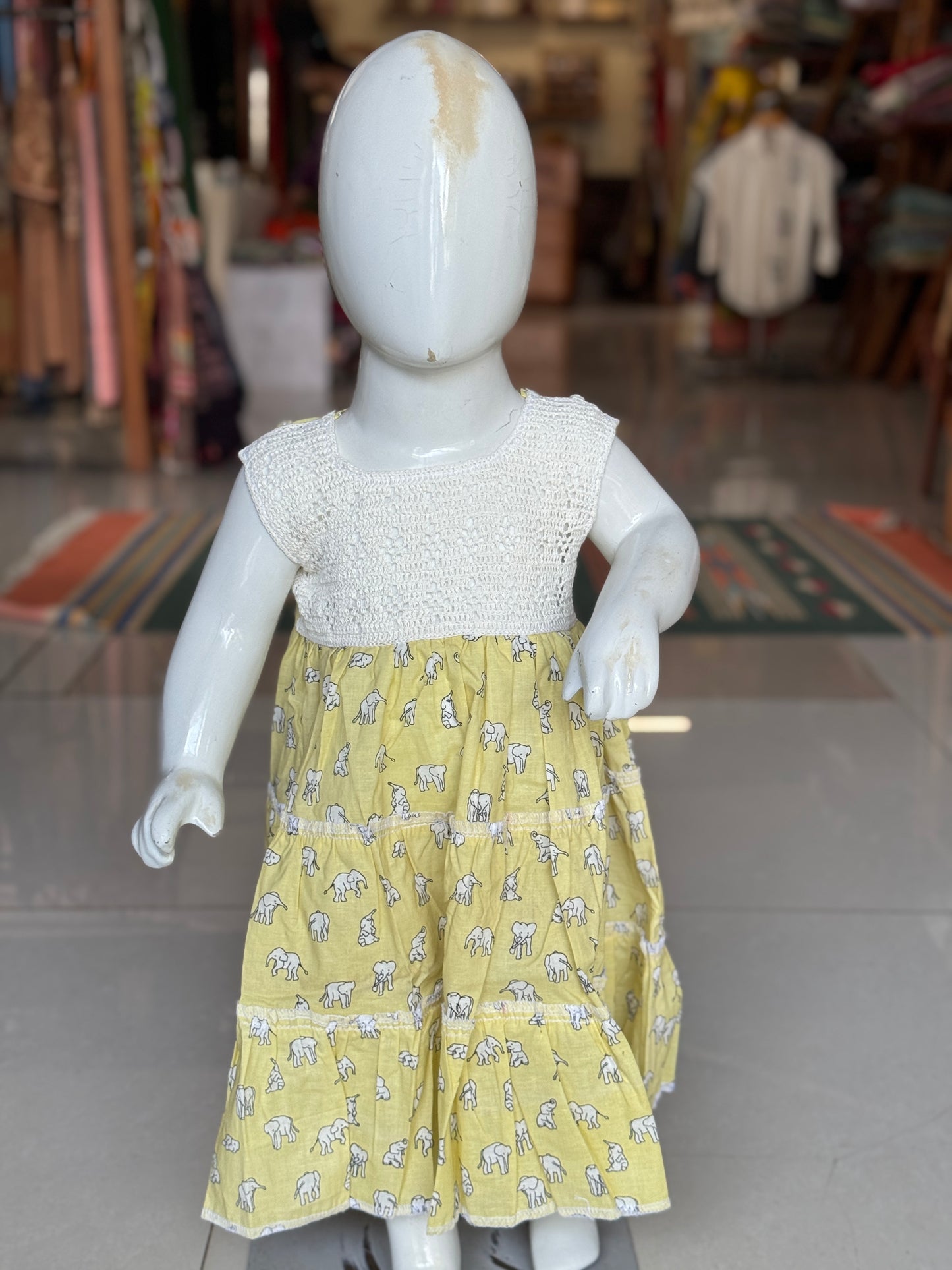 Tiered hand block printed cotton frock with crochet yoke for girls