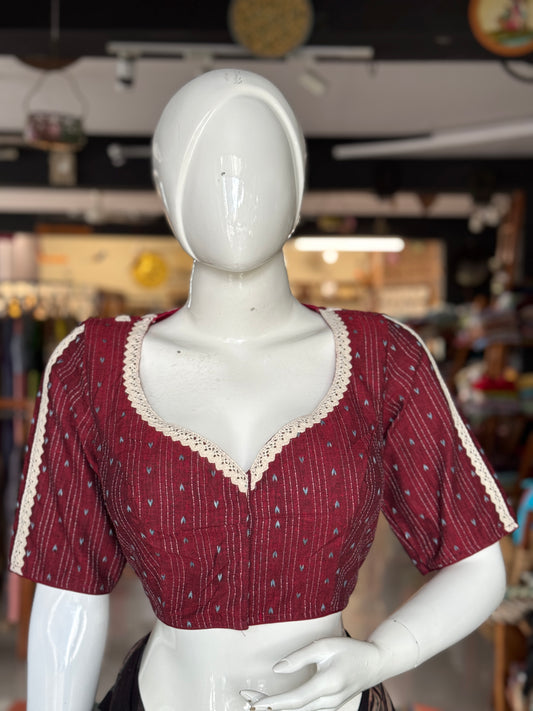 Maroon cotton blouse with multiple lace lines on back, sleeves and front